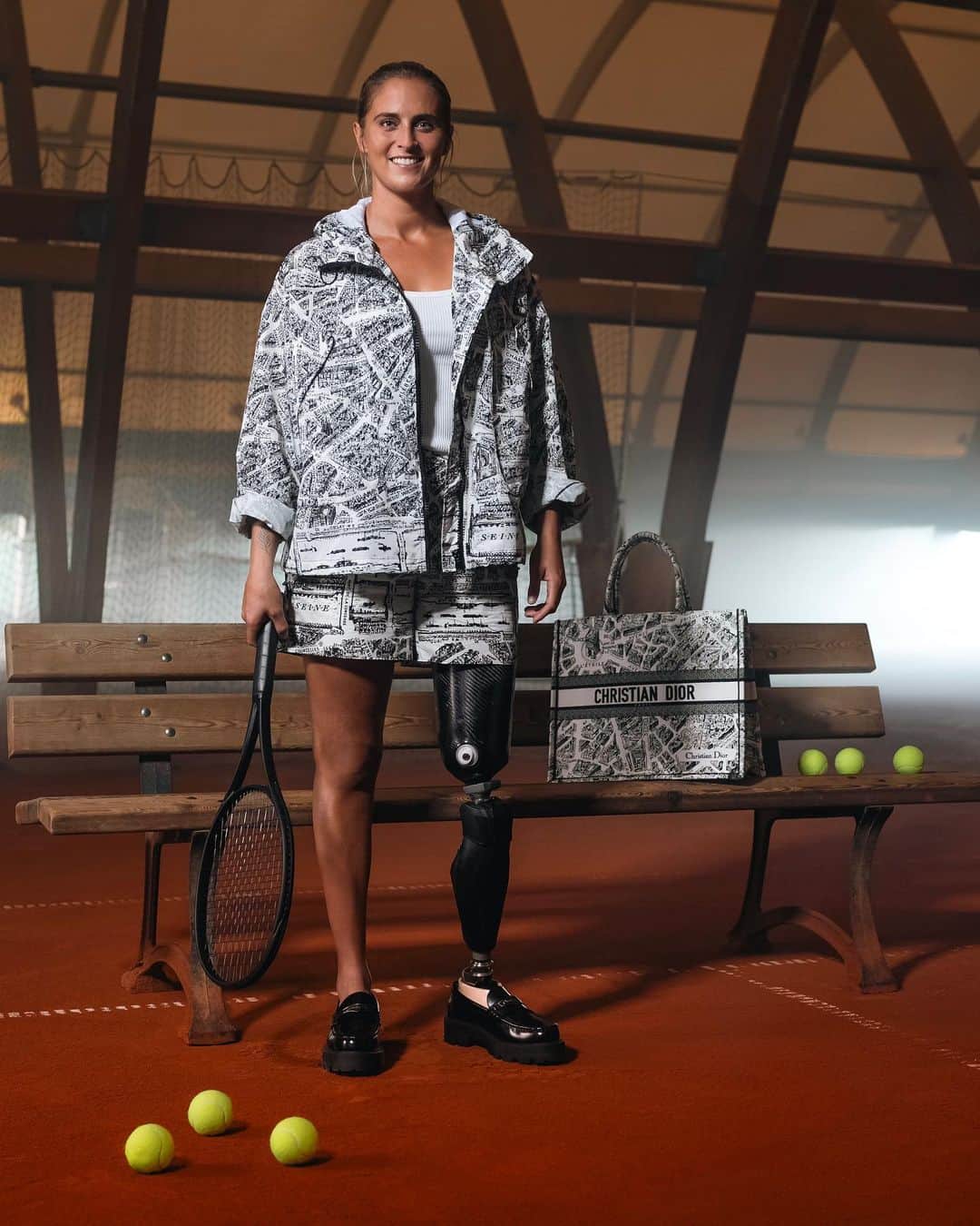 クリスチャンディオールさんのインスタグラム写真 - (クリスチャンディオールInstagram)「Dior is pleased to announce wheelchair tennis player @Pauline_Deroulede as its new ambassador for the upcoming Paralympic Games @Paris2024 in the City of Light so dear to the founding couturier. The three-time French champion is pictured here in a Plan de Paris Dior look by @MariaGraziaChiuri, with a matching #DiorBookTote. Extending the partnership signed between @Paris2024 and @LVMH, the House reaffirms its commitment to supporting and encouraging the dreams and talents of the younger generation.   Dior a le plaisir d'accueillir la joueuse de tennis fauteuil @Pauline_Deroulede en tant que nouvelle ambassadrice pour les prochains Jeux Paralympiques de Paris 2024, qui se tiendront à Paris, ville chère au couturier fondateur. La triple championne de France est photographiée ici dans un look Dior habillé du motif Plan de Paris imaginé par @MariaGraziaChiuri. Dans le prolongement du partenariat d’exception signé entre @Paris2024 et @LVMH, la Maison réaffirme son engagement à soutenir et encourager les rêves et les talents des jeunes générations.   #LVMH #ArtisanDeToutesLesVictoires © @Nelson_Rosier」11月2日 20時00分 - dior