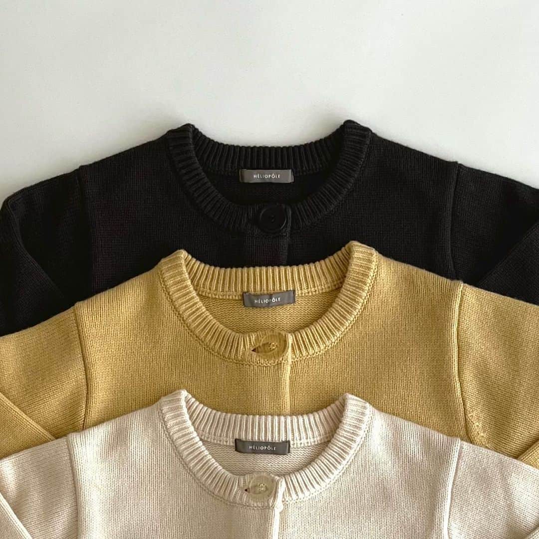 エリオポールのインスタグラム：「<Knit Collection>  WOOL BUTTON CARDIGAN  20.900yen / HÉLIOPÔLE   Ref: 23003047041HN Color: Ivory. Yellow. Charcoal gray Size: 38  下記店舗にてお電話での通販を承っております。  HELIOPOLE代官山店  03 3770 6438  HELIOPOLE 札幌店  011 209 5455  @heliopole_official #HELIOPOLE  #エリオポール」