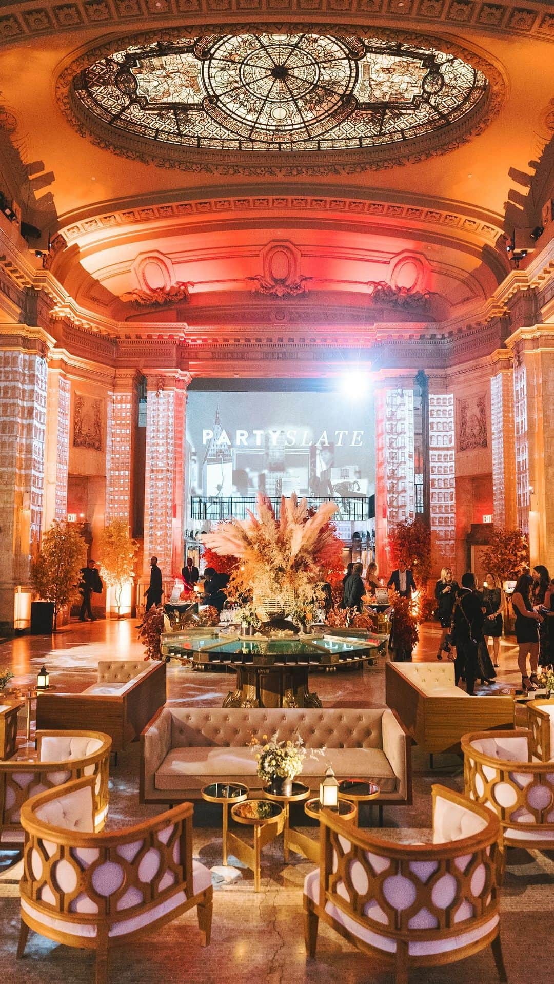 Ceci Johnsonのインスタグラム：「CORPORATE | Proud to partner with @partyslate at their Annual Premium Member Event, THE PARTY, where we brought the beauty of autumn to life through our event graphics and invitation design. Each detail is inspired by @jesgordon ‘s vision to bring the feeling of New York City’s most colorful season, indoors. It was a fantastic event and we had an incredible time being part of it!  #CeciCouture  CREATIVE PARTNERS Invitation, Event Branding + Signage: @cecinewyork Planning + Creative Design: @properfunevents @jesgordon Venue: @halldeslumieres  Entertainment: @jordankahnorchestra Catering: @rhchospitality Furniture: @rentquest_nyc Photography: @afrikarmando Videography: @kennethcooperfilms Signage + Printing: @bombshellgraphics Catering Rentals: @partyrentalltd Custom Scent: @scenting_events Custom Tote Bags: @hnrcrew Takeaway Cookies: @vincenzo_salvatore_cakes  #cecinewyork #partyslate #partygraphicdesign #partystationery #nycparty」