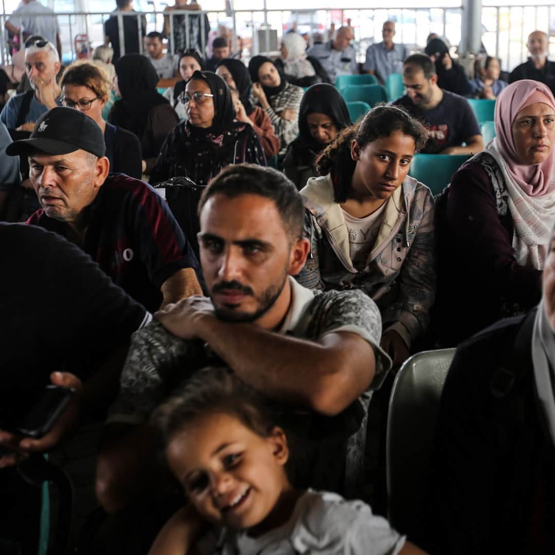 TIME Magazineさんのインスタグラム写真 - (TIME MagazineInstagram)「Citizens with foreign-passports have begun crossing from Gaza into Egypt at the Rafah Border Gate, the first group to do so since the war between Israel and Hamas broke out on Oct. 7.  Egypt, which has the only non-Israeli controlled crossing with Gaza, is a lifeline for crucial humanitarian aid for the territory’s 2.3 million residents. More than 8,500 Palestinians have been killed in the conflict, according to authorities in Hamas-run Gaza.  Images show Palestinian officers inspecting passports, crowds of people waiting to cross the border, and ambulances carrying injured Palestinians wounded in the Israeli bombardment of Gaza. Those wounded have been taken to nearby hospitals, while Egypt is also preparing a field hospital in the area.  Link in bio.  Photographs by Abed Rahim Khatib—picture alliance/AP; Samar Abu Elouf—The New York Times/Redux; Fatima Shbair—AP; Ahmad Hasaballah—Getty Images」11月3日 5時40分 - time