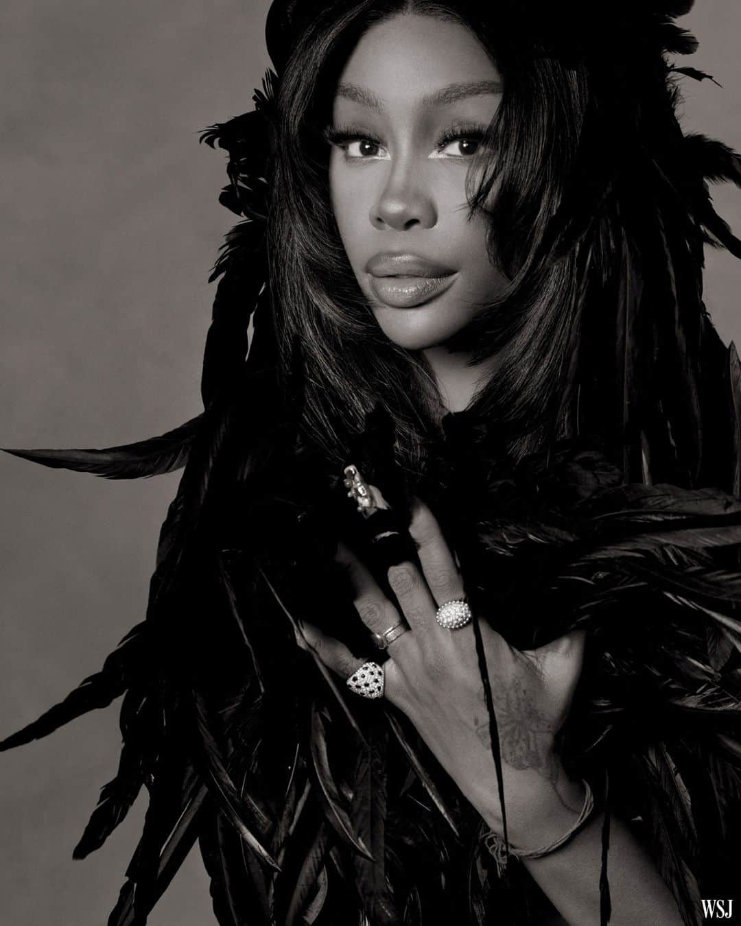 のインスタグラム：「SZA has become one of the most successful artists of her generation with her brash, anxious overshares.⁠ ⁠ The 34-year-old, born Solána Rowe, has been churning out intimate, thorny, genre-blending hits about self-love and self-loathing since she signed to the rap label Top Dawg Entertainment in 2013.⁠ ⁠ Her debut album, “Ctrl,” hasn’t left the Billboard 200 chart since July 2017. Her follow-up, “SOS,” dropped in December 2022; its 10 weeks on the chart made it the longest-running No. 1 album by a female artist of the decade. It also broke a record for most weeks atop the R&B chart.⁠ ⁠ The five years between “Ctrl” and “SOS” elevated @sza to superstar status. She became more famous by being less present. Her fans are ravenous, rushing to stream her music and selling out dates on her first headline arena tour.⁠ ⁠ Meanwhile, she’s obsessive about the music, and she takes every song personally. “I’ll die about that s—t every time,” she says. Everyone wants more songs, faster, now. SZA insists on taking her time.⁠ ⁠ “When I leave the studio, I feel better and empty,” she says. “There’s no better sleep than empty-brain sleep, and that can only come after I’ve been in the studio for 10 hours and done something good in there.”⁠ ⁠ Though her circuitous problems—love, heartbreak, ghosting, getting ghosted—have become signature subjects, she says she wants to write about the good stuff, too. “I go through so many other moments in life that are amazing, things that I could never describe,” she says. “I haven’t even tried to find words for those things.”⁠ ⁠ Read more at the link in our bio.⁠ ⁠ 📷: @ethanjamesgreen for @wsjmag」