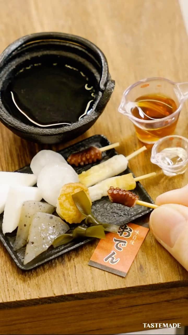 テイストメイドのインスタグラム：「【タコ足可愛い🫣】ちびちびおでん🍢Tiny Japanese Oden  大人気シリーズ #ちびめし 📺💛 そろそろおでんが食べたくなってくる時期🍢❄️ 身体の芯までじんわり温まるお出汁のきいたミニチュアおでんはいかが？  コメントでみんなの好きなおでんの具を教えてね☃️💭  ■材料 大根 1/4本分 こんにゃく 1枚 昆布 適量 たこ 適量 ちくわ 2本 はんぺん 1個 がんもどき 適量 水 1.5ml めんつゆ 0.7ml みりん 0.8ml 酒 1ml 鶏がらスープの素 0.1g からし 適量  ■作り方 1. 具材の下準備をする。 2. 鍋に調味料(水、めんつゆ、酒、みりん、鶏がらスープ)を入れる。 3. 具材を入れて煮る。 4. からしをつけて食べる。  Ingredients:  - 1/4 daikon radish  - 1 sheet of konnyaku (konjac)  - Some dried kelp (kombu)  - Some octopus  - 2 squid legs (chikuwa)  - 1 fish cake (hanpen)  - Some imitation crab (kanimodo)  - 1.5ml water  - 0.7ml noodle soup base (mentsuyu)  - 0.8ml mirin  - 1ml sake  - 0.1g chicken soup stock powder  - Some mustard (karashi)  Steps: 1. Prepare the ingredients. 2. In a pot, combine the seasonings (water, mentsuyu, sake, mirin, chicken soup stock). 3. Add the ingredients and simmer. 4. Serve with mustard.  #テイストメイド #料理  #cooking #recipe #japan #miniaturefood #ガチャガチャ  #レシピ #簡単レシピ  #おうちごはん  #おでんレシピ #japanesefood #こんにゃく #大根 #しらたき #もち巾着 #たまご #秋 #冬 #おでん #コンビニおでん #出汁 #ミニチュア #ミニチュアフード  #miniature  #TinyKitchen #がんも #ちびめし #たこ #ちくわ」