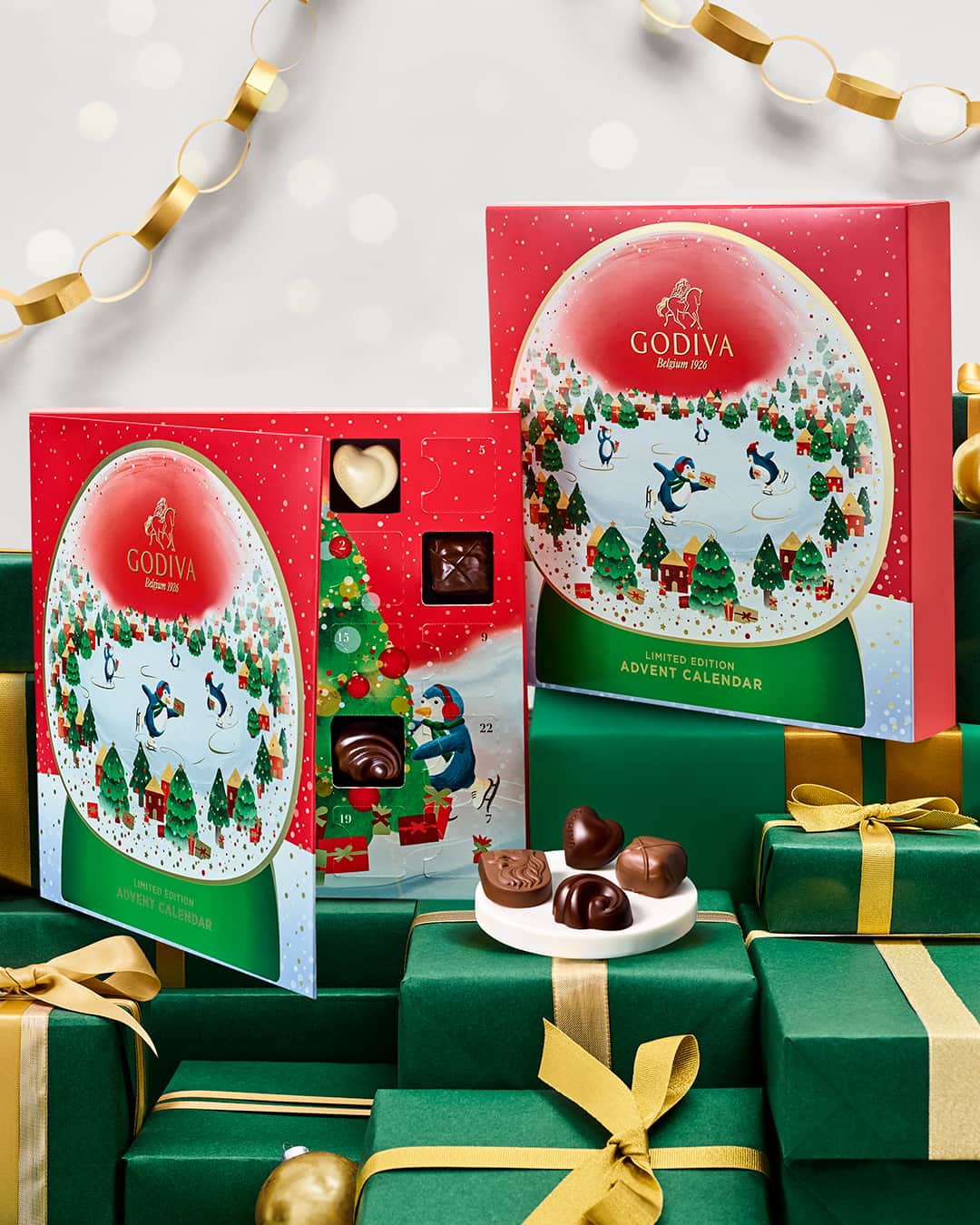 GODIVAのインスタグラム：「Our new Holiday Chocolate Advent Calendar is here to help you start the ultimate chocolate countdown to the holidays! Purchase now on GODIVA.com to see what surprises await you this holiday season. 🎁」