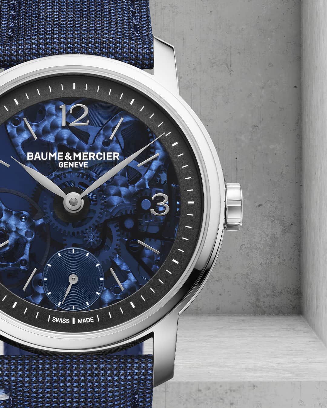 のインスタグラム：「Embark on a journey through time with the unveiling of our Classima Special Edition 10735. Imagine the delicate dance of gears and springs as this 42mm timepiece comes to life with its manual movement.  The skeleton dial, a window to the heart of precision, framed by a captivating blue sapphire and and black accents, tells a story of craftsmanship beyond measure.  A symphony of sophistication and contemporary flair awaits. Immerse yourself in the artistry of every moment. -- Classima 10735 42 mm, Manual Skeleton Small seconds, Stainless steel case, Blue sapphire crystal dial, Fast Strap technology - Interchangeable strap system. -- #BaumeetMercier  #ShapingTime  #Classima  #DailyWatch  #Watches #Watch #InstaWatch #WatchOfTheDay #WatchesOfInstagram #WatchLover #WatchCollector #LuxuryWatch #InstaWatch #Style  #Elegant #WristWatch #Timepiece #WatchMaking  #InstaWatches」