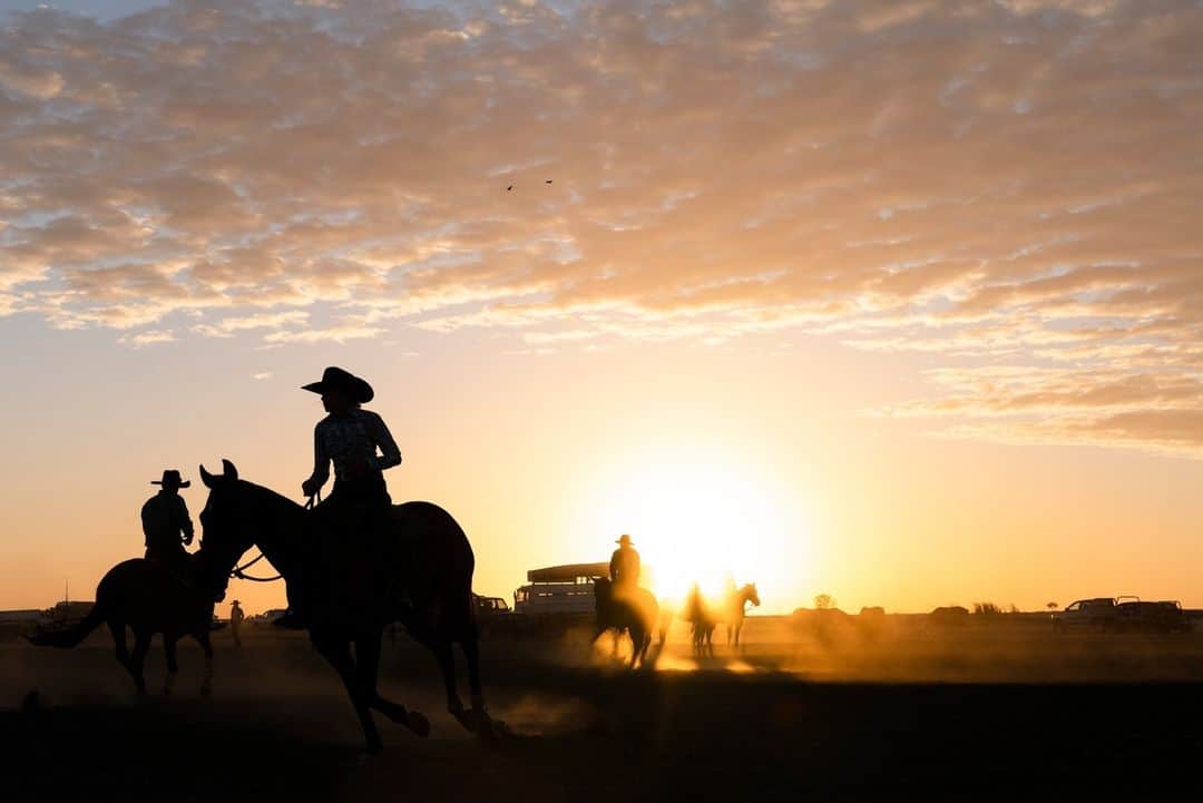 National Geographic Travelのインスタグラム：「Photo by @krystlejwright | Cowboys gather on the outskirts of Richmond in rural Queensland, Australia, for a local rodeo event.」