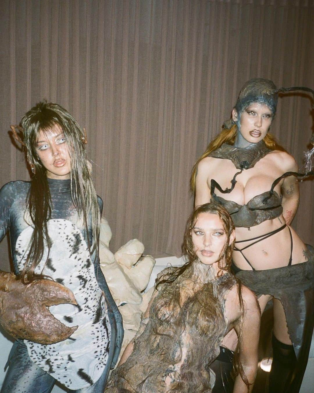 Dazed Magazineのインスタグラム：「This Halloween, @yaz_____xl transformed her muses into c*nty beasts of the deep 🦀🪸🧪⁠ ⁠ On a warm, winter All Hallows Eve, celestial sea creatures from the depths of designer Yaz XL's imagination clambered their way from the “radioactive” shores of Formentera to @thestandardibiza for a night of devilish Halloween debauchery. ⁠ ⁠ Tap the link in bio to see more of the night's fishy looks including the addition of a third tit, murky water blisters, neon red sun burns and jelly fin prosthetics.⁠ ⁠ Costume and curation by @yaz_____xl⁠ ✍️ @lam.barakat⁠ 📸 @chestermckee⁠ SFX @tildax_x_⁠ Special thanks to @thestandardibiza⁠ ⁠ #DazedBeauty #Halloween⁠」