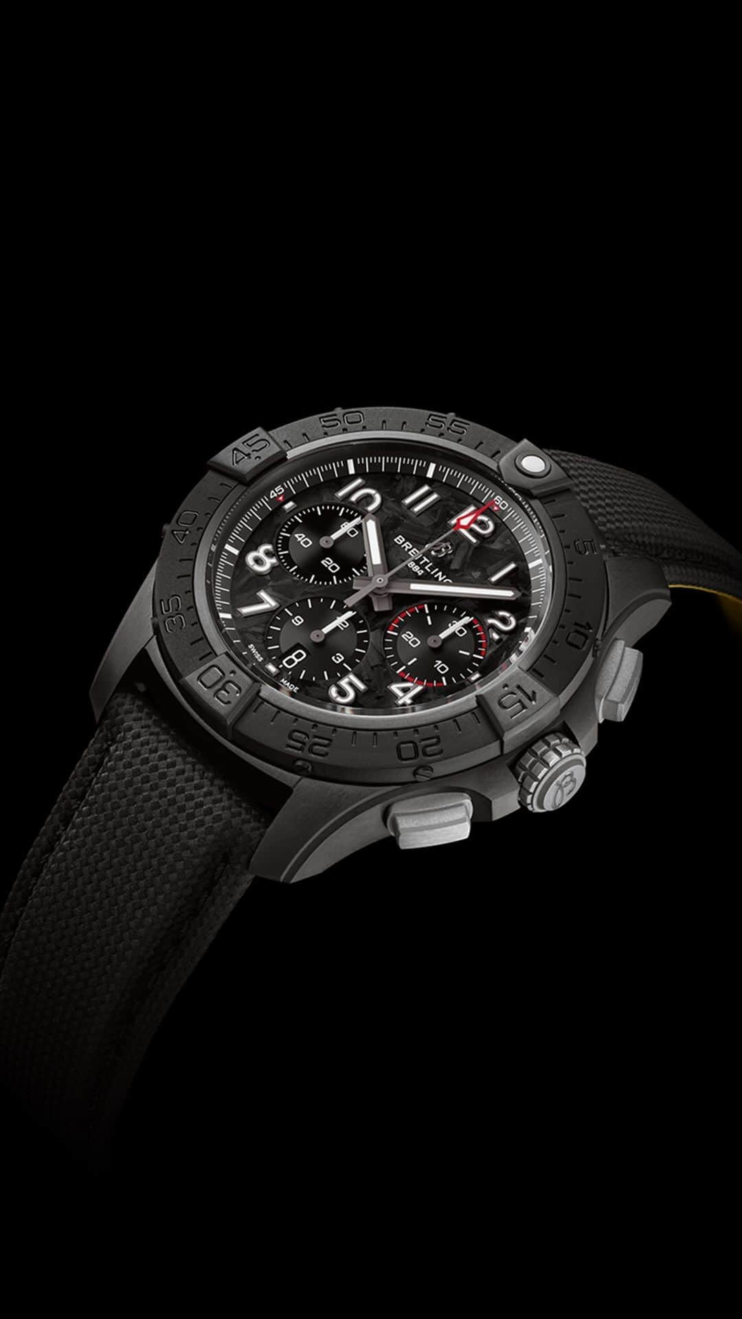 ブライトリングのインスタグラム：「The Avenger Night Mission chronograph has a case and bezel made entirely of scratch-resistant ceramic. Its caseback, crown, pushers, and buckle, meanwhile, are crafted in solid titanium, providing the highest strength-to-weight ratio of any metal.   #breitling #squadonamission #avenger #watches #pilotswatch #aviation #chronograph #ngihtmission #yellowdial #balckdial #ceramiccase」