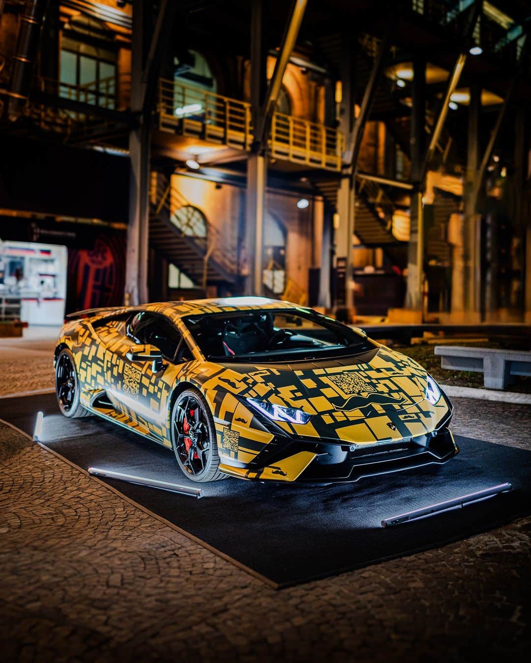 ランボルギーニのインスタグラム：「It may look like a super sports car, as always. But look closer and you'll figure out that's a vehicle for change.   @movember @officialbolognafc   #QRCodeLamborghini __ Huracán Tecnica: fuel consumption combined: 14,5 l/100km (WLTP); CO2-emissions combined: 328 g/km (WLTP)」