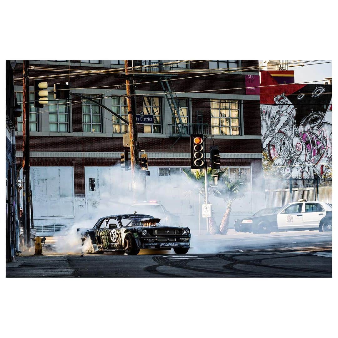 ケン・ブロックのインスタグラム：「Never before seen photos of @kblock43 whipping the #HOONICORN around #LA during the filming of #gymkhana7.  I had all the “bangers” as Ken referred to them as archived like the Randy’s Donut photo, but I hadn’t looked back through all the photographs since we shot everything in 2014. There were so many amazing moments during our 5 long days of filming. I especially like the way Ken is leaning in the second photo trying to get the car back on all four wheels.  #KB43VER. ❤️」