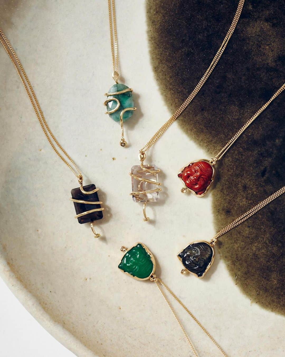 チャンルーさんのインスタグラム写真 - (チャンルーInstagram)「Serpents and lucky buddhas 🐍 14k yellow gold necklaces inlaid with champagne diamonds, featuring green quartz, emerald, red jasper, green amethyst, and smoky quartz.」11月5日 3時09分 - chanluu