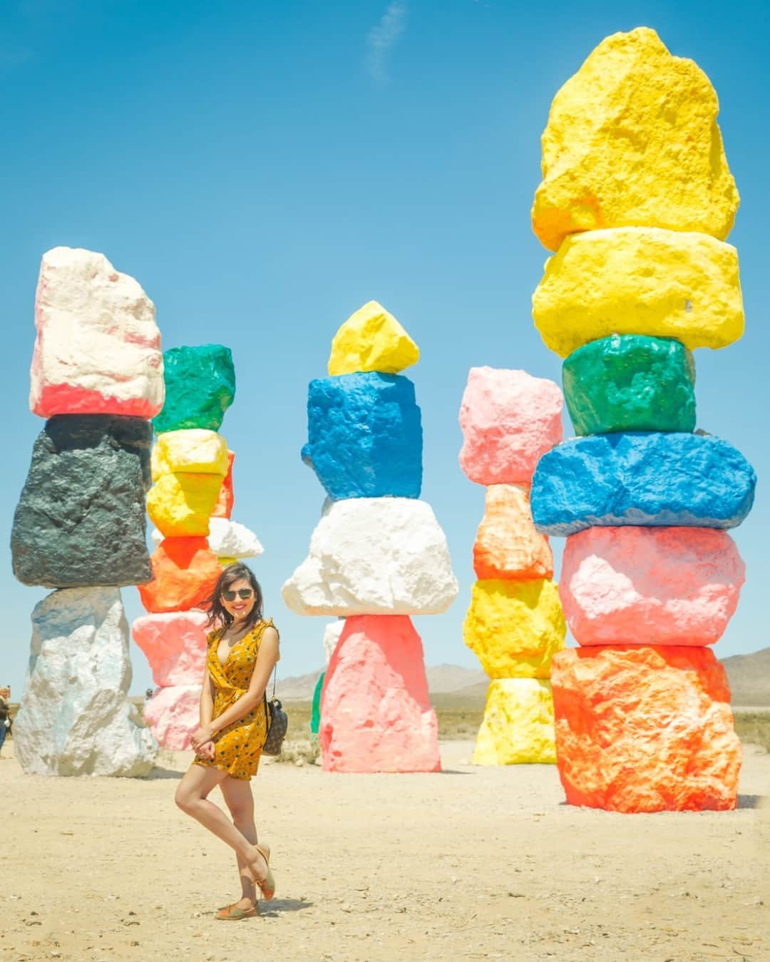 Visit The USAのインスタグラム：「Located just 25 minutes from the Las Vegas Strip, The Seven Magic Mountains in Clark County, Nevada, almost feel like a neon-colored mirage in the desert. This free attraction is a must-add for your Vegas vacation photo dump! Oh, and K-Pop fans… Saw Bae Suzy in Doona! visited this magical spot 👀  #VisitTheUSA #SevenMagicMountains #Nevada  #LasVegasTrip #KPoP #Doona!」