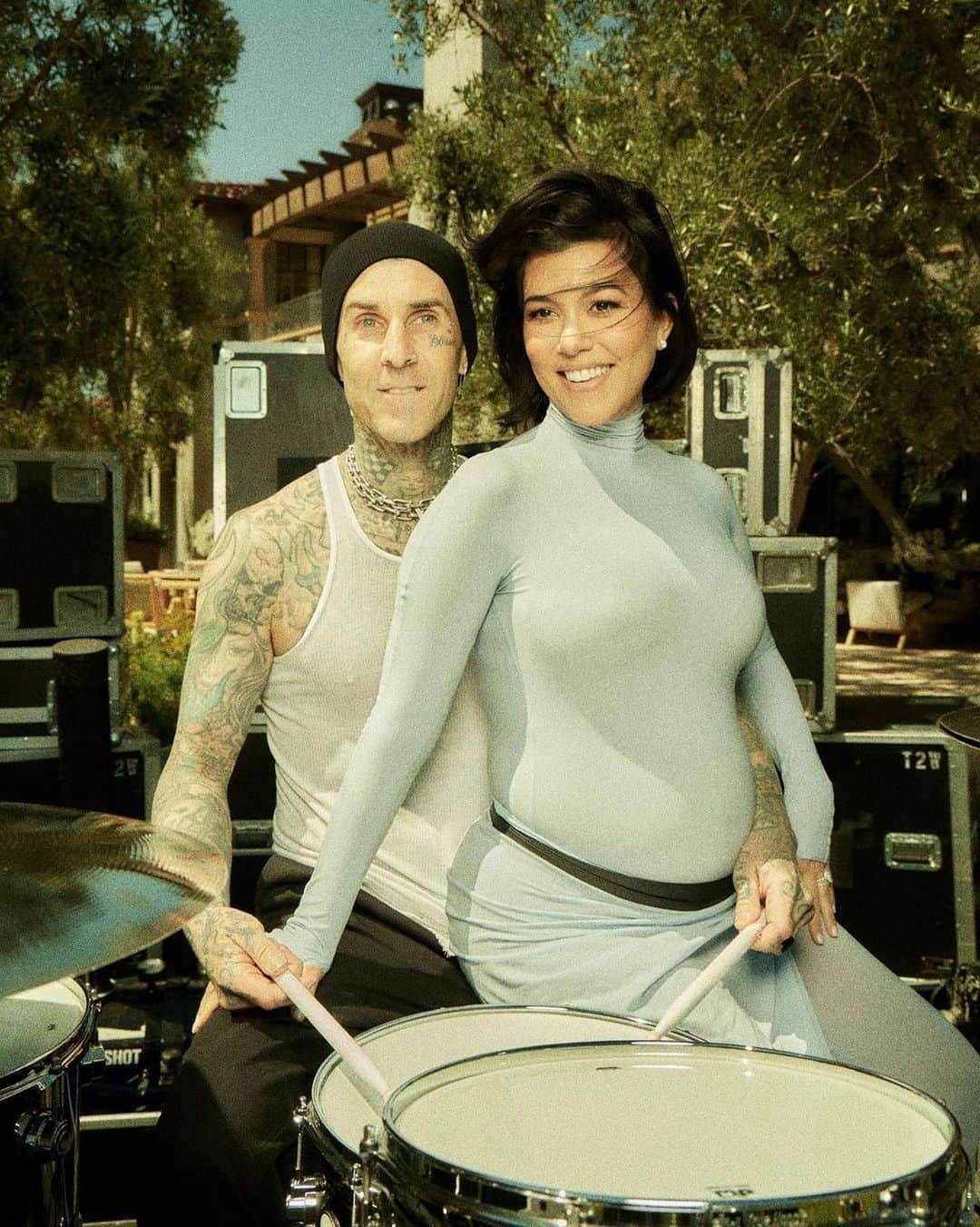 British Vogueのインスタグラム：「After marrying in a lavish Italian ceremony in 2022, #KourtneyKardashian and #TravisBarker have welcomed their first baby together. The couple, who both have children from previous relationships, first announced that they were pregnant when Kardashian held up a “Travis I’m Pregnant” sign at a Blink-182 concert. Click the link in bio for more on the joyous news – and their unique baby name.」