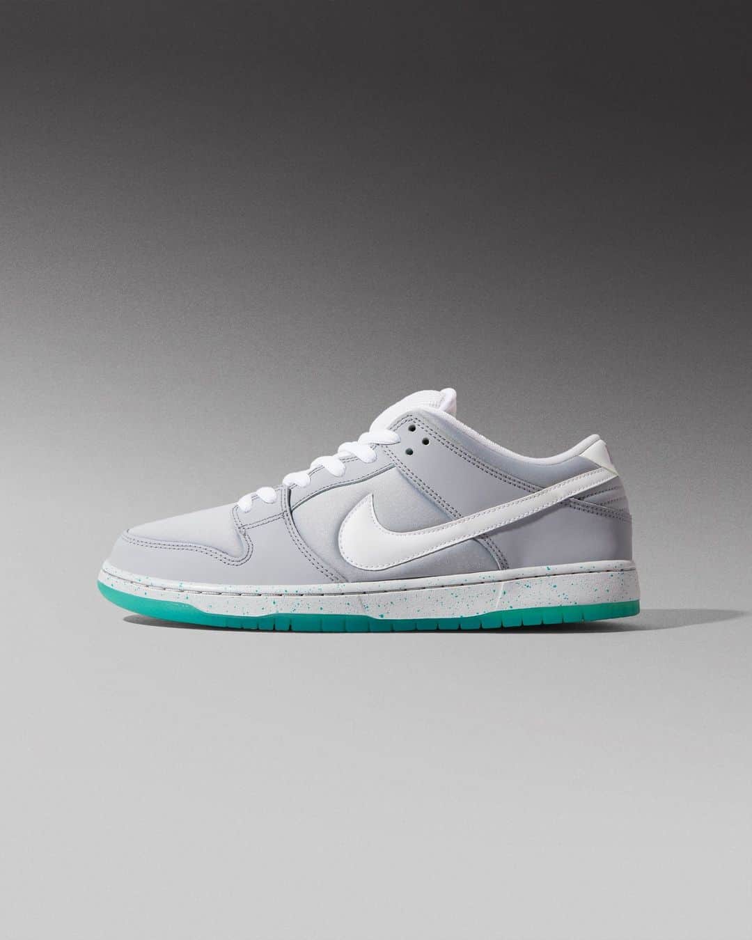 Flight Clubのインスタグラム：「From hoverboards to skateboards, the SB Dunk Low 'Marty McFly' takes after the legendary self-lacing Nike Mags seen in Back to the Future Part II. The 2015 design sports a Wolf Grey upper with a clean white Swoosh and speckled detailing on the midsole. A translucent teal outsole rides underfoot.」