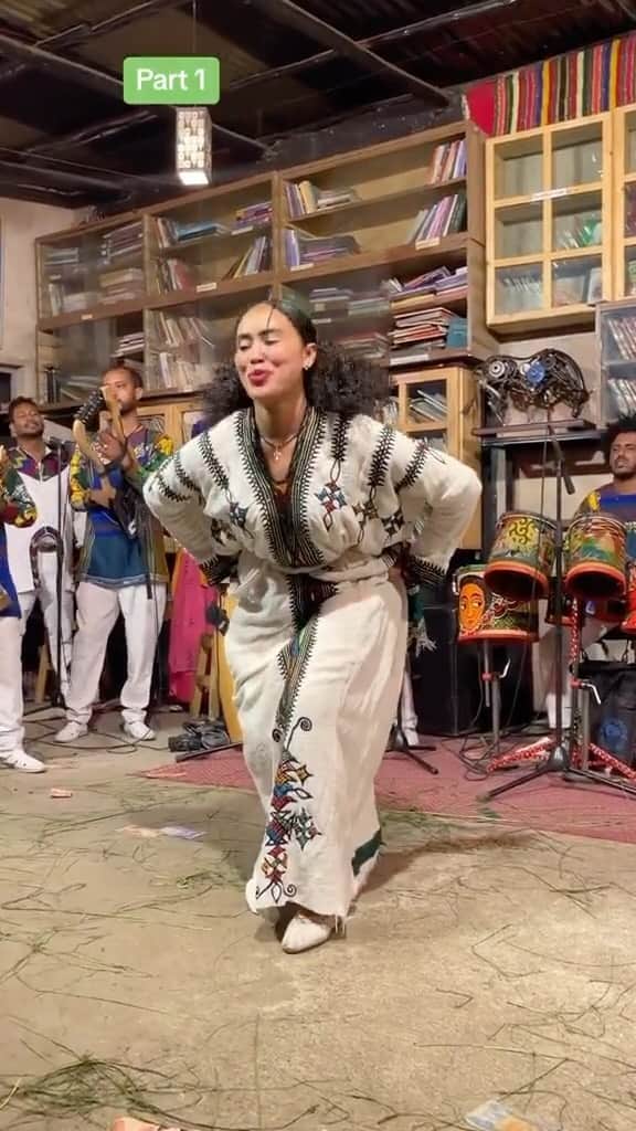 Earth Picsのインスタグラム：「This is a traditional Ethiopian Gonder dance (eskista)and outfit. Gondar, a historic city in the northern part of Ethiopia, is celebrated for its Fasil Ghebbi, a fortress-palace enclosure that was the home of Ethiopian emperors. Its centerpiece is the grand castle built by Emperor Fasilides in the 17th century, which is a unique fusion of Portuguese, Indian, and indigenous architectural influences. Nearby, the Debre Berhan Selassie church is famed for its intricate wall paintings and a ceiling adorned with numerous faces.  🎥 @maritaethio  📍 Ethiopia 🇪🇹」