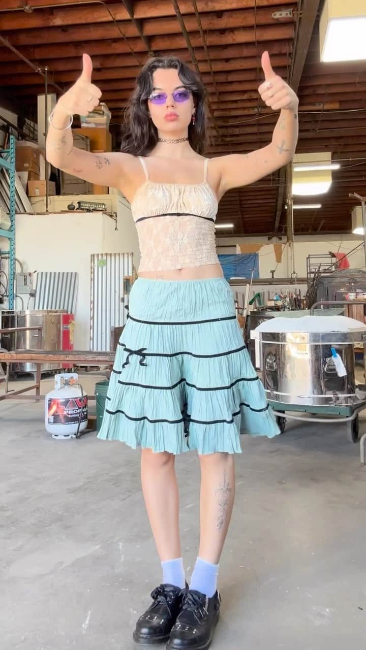 Urban Outfittersのインスタグラム：「Flames and frills: @isabellalalonde making glass beads in the Kimchi Blue Kira Lace & Bow Cami and Lillian Bow Midi Skirt. 🎀🔥 #uocommunity」