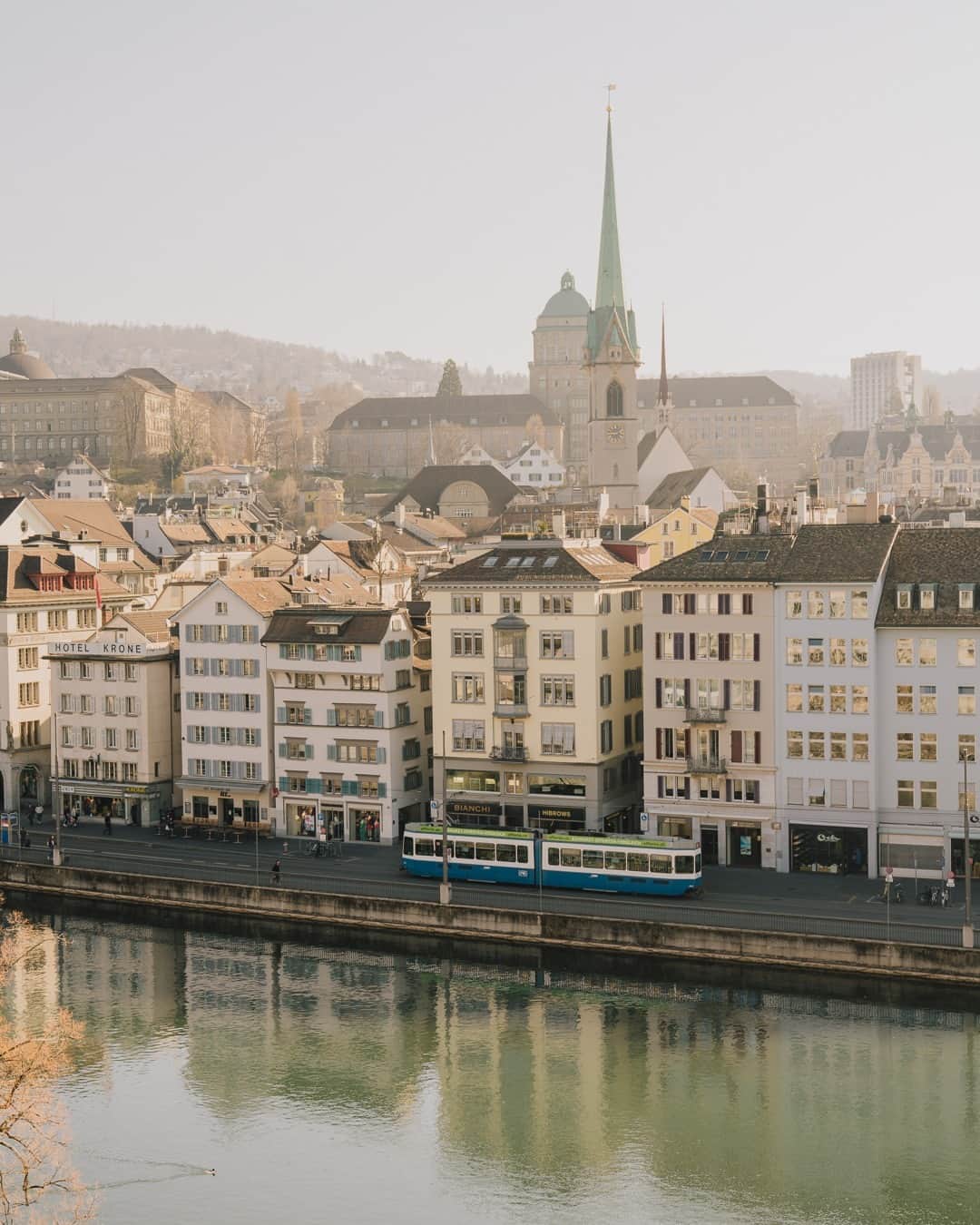 National Geographic Travelのインスタグラム：「Photos by @kevinfaingnaert | Roaming through Zurich's Old Town is like taking a journey through history. Old trams clatter by, chess matches unfold on historic squares, and ornate old buildings rise proudly against the skyline. It's a city where past and present coexist in perfect harmony.」