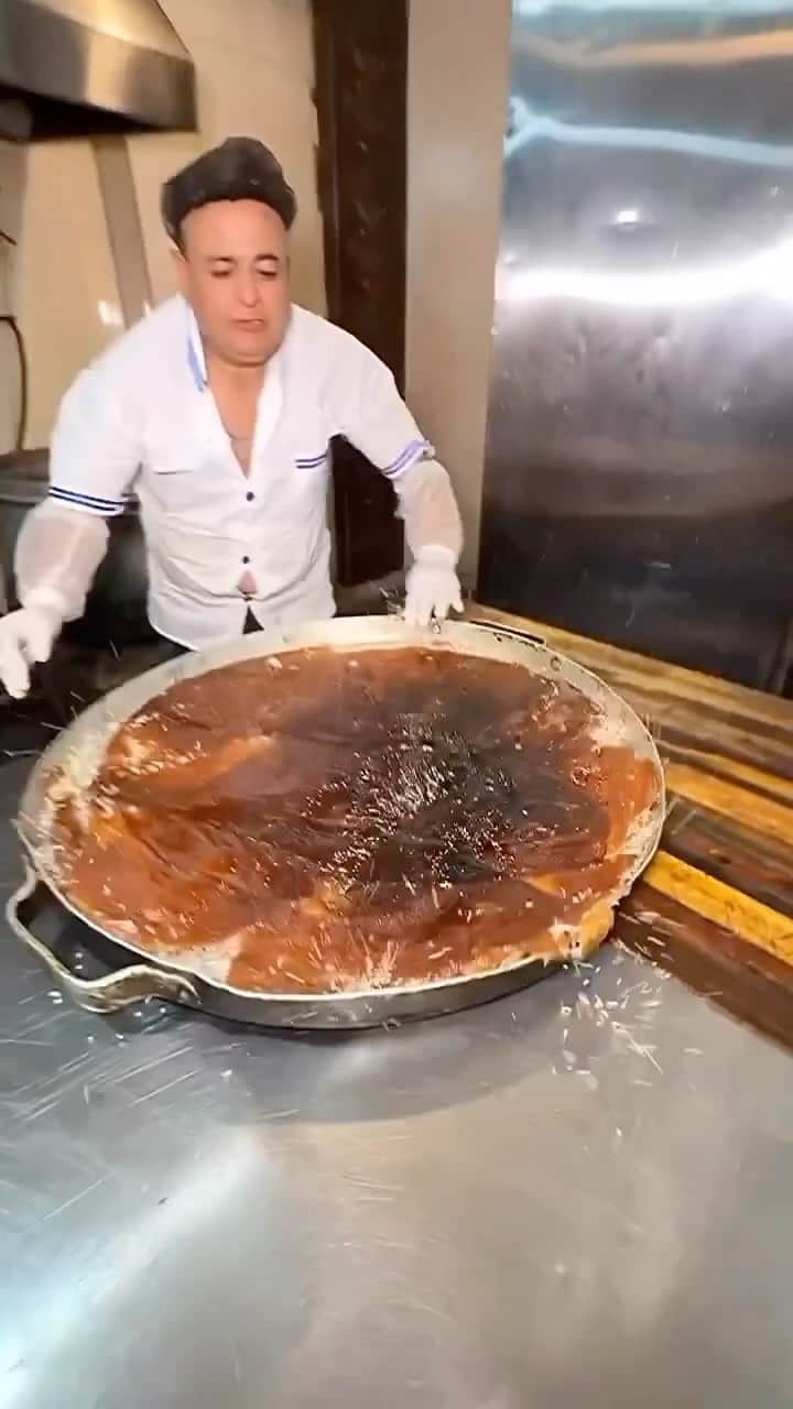 Earth Picsのインスタグラム：「Have you ever tried Tahdig?  Tahdig is a speciality of Persian cuisine and literally translates to “bottom of the pot.” It refers to the crispy, golden layer of rice that forms at the bottom of the pot while the rice cooks. This layer is highly prized and is often considered the best part of the rice dish by many. Tahdig can also be made with bread or potatoes, which are placed at the bottom before the rice is added, creating a crusty base after cooking.  Making tahdig involves a careful cooking process where rice, along with other ingredients like yogurt and sometimes saffron, is layered in a pot and cooked over a low heat. This results in a delicious contrast between the fluffy, soft grains of rice at the top and the crunchy, toasted layer at the bottom. It’s typically served on special occasions and is a cherished element in a traditional Persian meal.  🎥 @polo_khoresh」