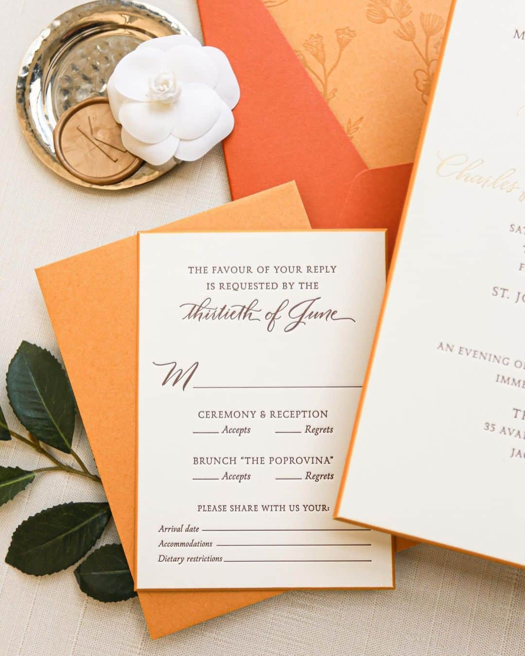 Ceci Johnsonさんのインスタグラム写真 - (Ceci JohnsonInstagram)「WEDDING | Presenting our couture invitation for Kacey and Charlie’s Jackson Hole, Wyoming wedding featuring the warm color of autumn. Hand-stained wood, brown and gold foil letterpress on 4-ply luxe paper, with a custom-converted envelope. #CeciCouture ⠀⠀⠀⠀⠀⠀⠀⠀⠀ Visit our last post to see the beautiful wedding reception that went with this invitation design. ⠀⠀⠀⠀⠀⠀⠀⠀⠀ CREATIVE PARTNERS:  Invitation Design: @cecinewyork Event Planner: @augustacole Event Designer: @david_stark_design ⠀⠀⠀⠀⠀⠀⠀⠀⠀ #cecinewyork  #invitationsuite  #autumnvibes  #autumninvitations  #wyomingwedding  #orangeinvitations  #letterpress  #luxuryinvitations」11月7日 23時59分 - cecinewyork