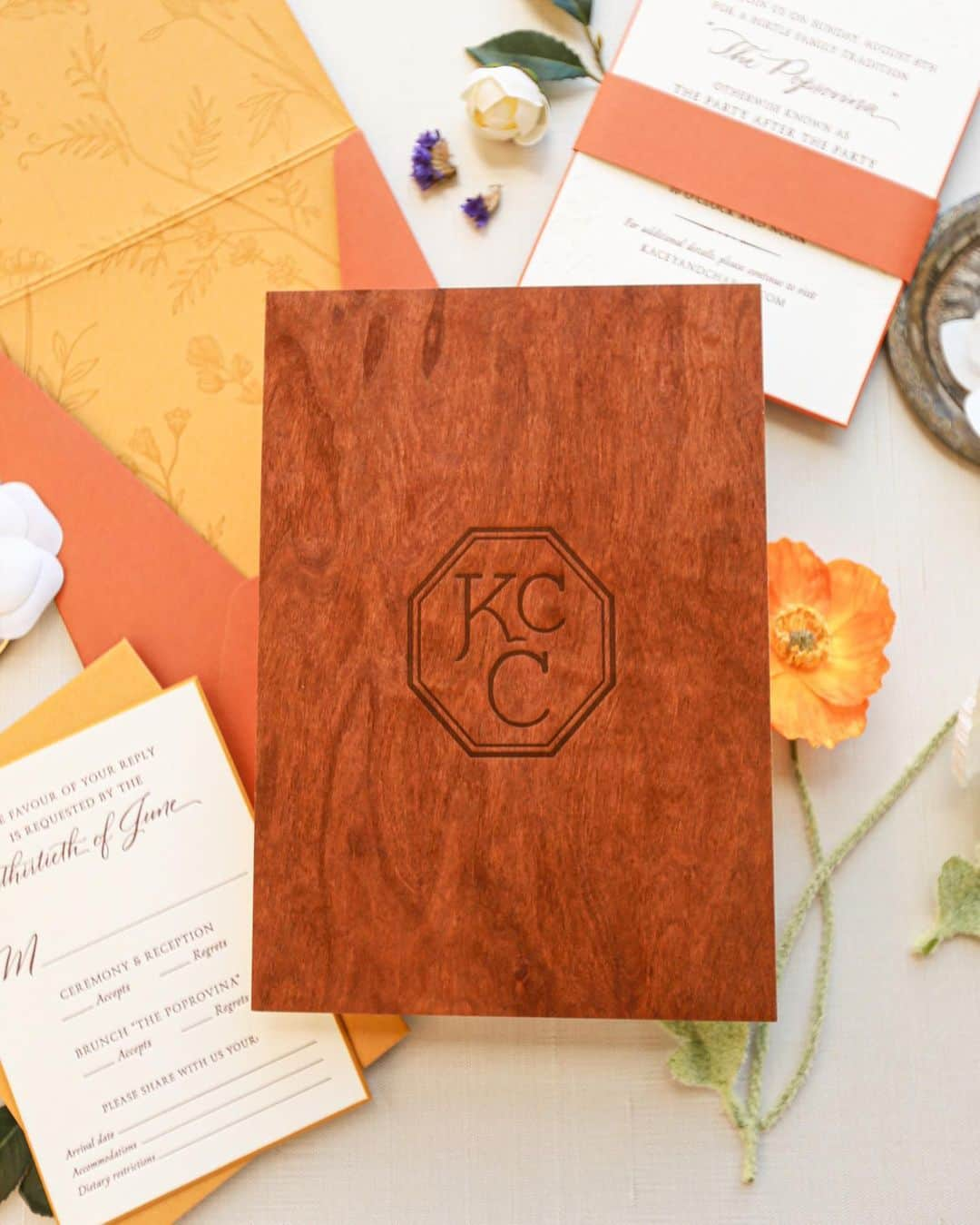 Ceci Johnsonさんのインスタグラム写真 - (Ceci JohnsonInstagram)「WEDDING | Presenting our couture invitation for Kacey and Charlie’s Jackson Hole, Wyoming wedding featuring the warm color of autumn. Hand-stained wood, brown and gold foil letterpress on 4-ply luxe paper, with a custom-converted envelope. #CeciCouture ⠀⠀⠀⠀⠀⠀⠀⠀⠀ Visit our last post to see the beautiful wedding reception that went with this invitation design. ⠀⠀⠀⠀⠀⠀⠀⠀⠀ CREATIVE PARTNERS:  Invitation Design: @cecinewyork Event Planner: @augustacole Event Designer: @david_stark_design ⠀⠀⠀⠀⠀⠀⠀⠀⠀ #cecinewyork  #invitationsuite  #autumnvibes  #autumninvitations  #wyomingwedding  #orangeinvitations  #letterpress  #luxuryinvitations」11月7日 23時59分 - cecinewyork