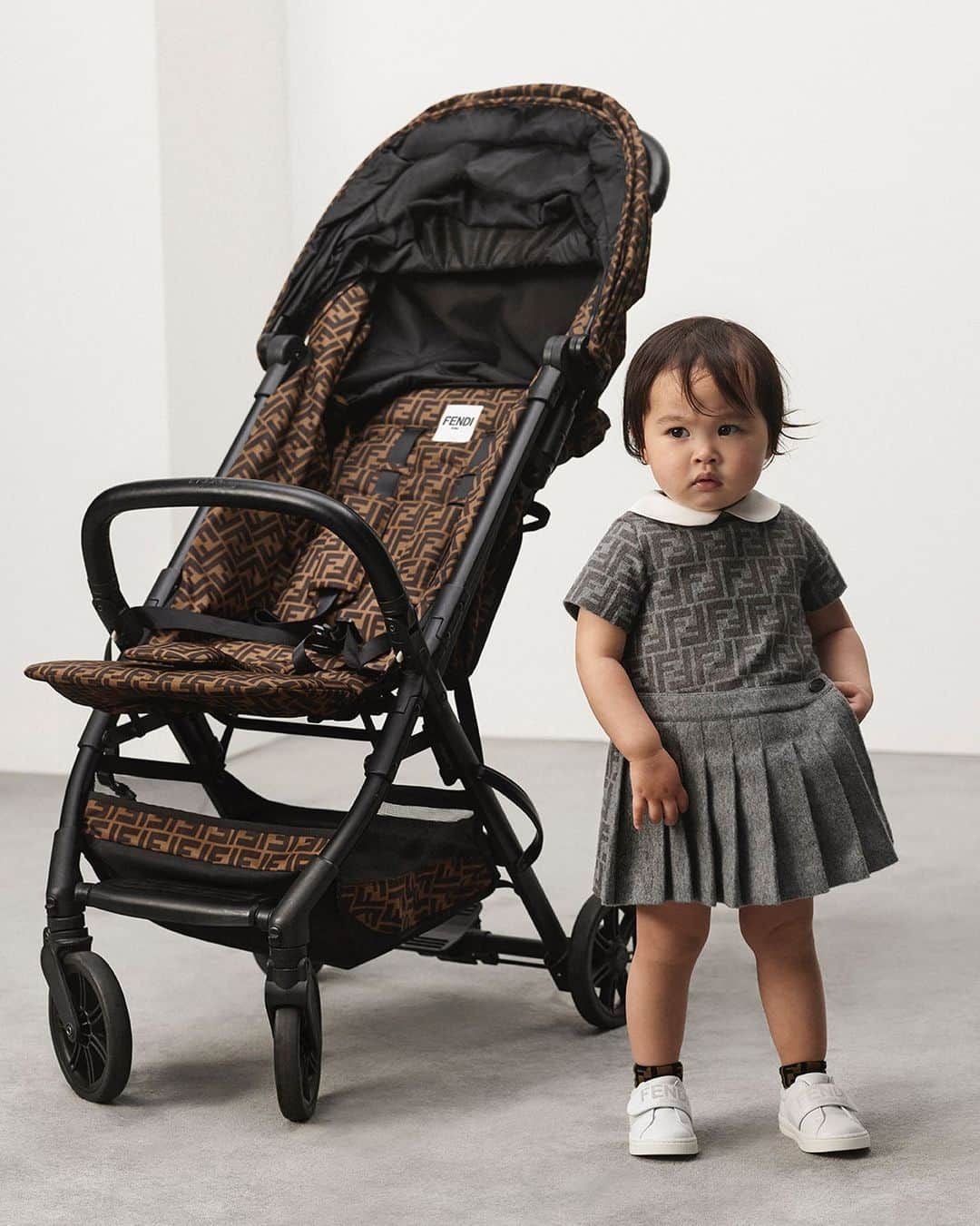 Fendiのインスタグラム：「From strollers and travel accessories to sweet dresses in a heritage jacquard knit, everything #FendiKids need to hit their stride in style awaits in boutiques and at Fendi.com.」