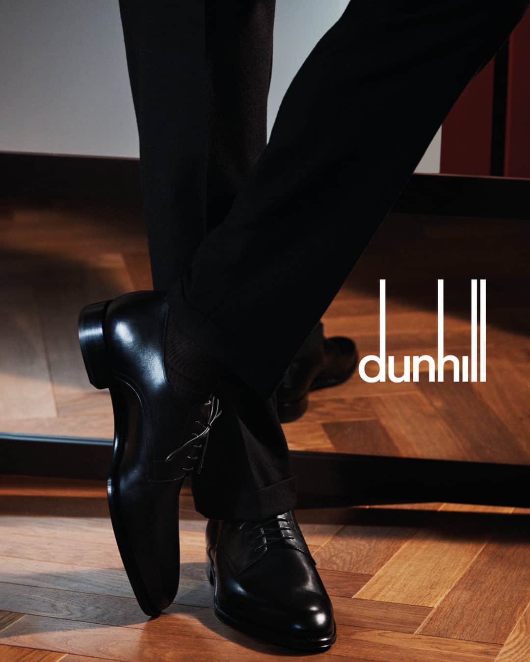 のインスタグラム：「Discover evening wear and festive gifts that tell a story in-store and online at dunhill.com  dunhill’s black Kensington Derby shoes are engineered in Italy from premium French calf leather with a classic British Goodyear-welted construction. A distinctly polished addition to your party attire.  Photographed by @thurstanredding and styled by @stuartvwilliamson.」