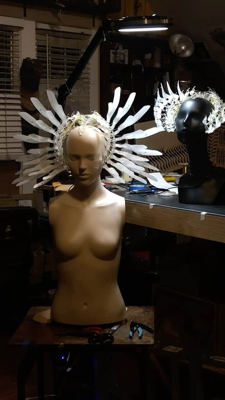 Iris Van Herpeのインスタグラム：「Inside the atelier ~ @Casey_Curran’s  kinetic craftsmanship in motion for the ‘Iris van Herpen. Sculpting the Senses’ retrospective at Musee des Arts Decoratifs.  The flowing futurity crowns, designed for the ‘Roots of Rebirth’ collection, will soon be visible up close at @MadParis, alongside 220 Haute Couture designs, artworks and runway accessories.  #irisvanherpen #hautecouture #exhibition」