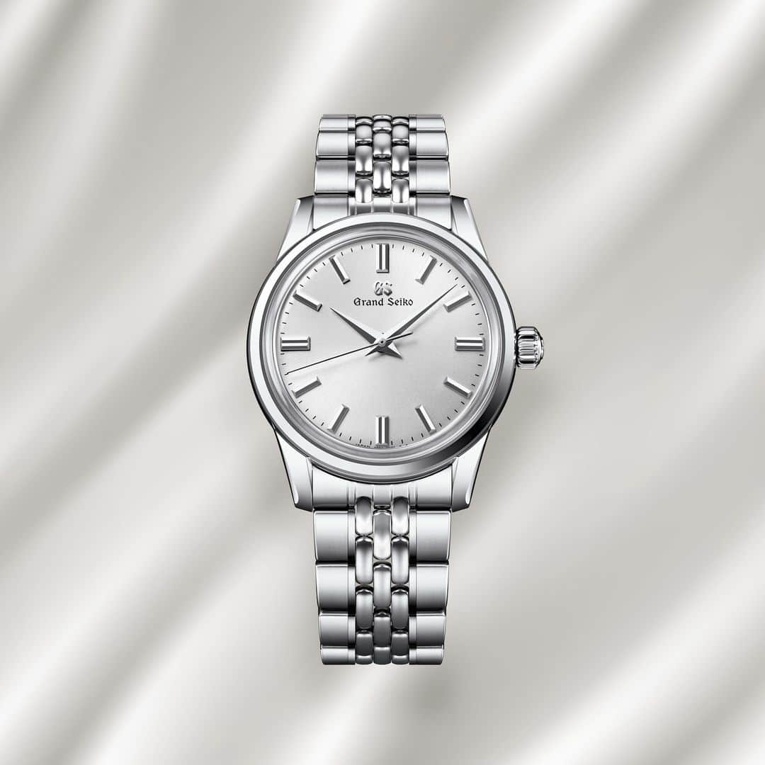 Grand Seikoのインスタグラム：「【New product】 #SBGW305  As the saying goes, good things come in small packages. With its moderate size and box-shaped sapphire glass, SBGW305 abounds in midcentury charm and elegance. The elegant silver-colored dial is gently rounded, and the tips of the minute and seconds hands are bent by hand to follow the contour of the dial and ensure legibility.  The manually wound movement features a maximum continuous power reserve of 72 hours (about three days).  The see-through case back provides a window into the beauty of the manually wound movement within.  #grandseiko #thenatureoftime #aliveintime」