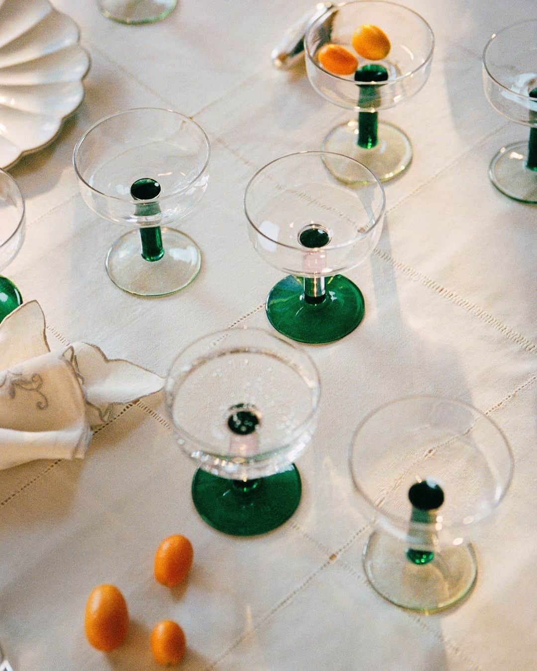 ARKETのインスタグラム：「Delicate coupe glasses for cold drinks, ice cream or sparkling wine. A clean design with a colourful fot. Sold in pairs. Explore all of our newest homeware: link in bio. - #ARKET」