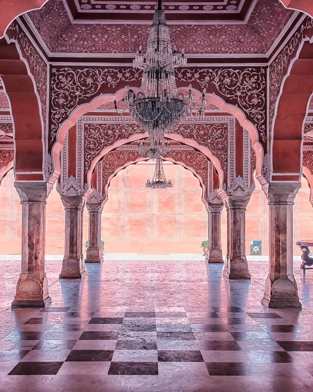 Rosetta Stoneさんのインスタグラム写真 - (Rosetta StoneInstagram)「#Jaipur, also known as the Pink City, is a vibrant and culturally rich city that offers a unique blend of history, art, and architecture. With its magnificent forts, palaces, temples, and colorful bazaars, it is a must-visit destination for anyone traveling to #India.   Here are 6 interesting facts about Jaipur you might not know:  1. Jaipur was founded during the reign of Maharaja Jai Singh on November 18, 1727, and took about four years to complete. Maharaja Jai Singh employed proficient architects in planning the city. Jaipur was the first "planned city" in India.   2. In 1876, the Prince of Wales and Queen Victoria came to visit Jaipur. Maharaja Ram Singh, who ruled Jaipur at the time, decided to welcome his guests by coloring every building in Jaipur pink. In India, pink is traditionally the color associated with hospitality and vibrancy.   3. It is home to 3 forts (Amber Fort, Jaigarh Fort, and Nahargarh Fort) and more than 5 palaces. Hawa Mahal (which means "Palace of Winds") is a unique tower palace in Jaipur. The palace has 953 windows, which allows the wind to blow inside and keep it cool. Jal Mahal is another popular palace, which is located in the middle of the Man Sagar Lake and is more than half-submerged in water. At first glimpse, it gives you the illusion that it is floating atop the lake.   4. Jaipur has many famous temples. One of these is renowned due to its monkeys. The Galtaji Monkey Temple is built in a forested and hilly region 10 km from Jaipur, and a water spring flows from the top of the hill and collects in seven pools around the temple. It makes the entire temple a very calm, peaceful, and relaxing tourist spot.  5. Jaipur is one of the largest producers of gemstones in the world, particularly of high-quality colored stones such as emeralds, rubies, and sapphires. The Johari Bazaar is a popular destination for buying gemstone jewelry.   6. Jaipur hosts the world's largest free literary fest (named Jaipur Literature Festival) every January. It is attended by poets, authors, artists, and literary giants from all over the world.   Would you like to visit Jaipur?」11月9日 0時55分 - rosettastone