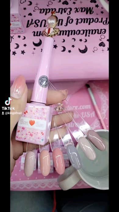 Max Estradaのインスタグラム：「Enailcouture.com new romance magic color change gels from bon bon are color changing gels that go from nude pink to a milky white fantasy ! Vegan Hypoallergenic and hema free, made in America and never tested on animals Enailcouture.com shinee star glitter gel top coats, no wipe formula. Vegan,  Hypoallergenic and hema free.  Made in America 🇺🇸  Enailcouture.com  #nailartwow #gelpolish #nailsartvideos #nails #gelnails #nailart #notd #nailcolor #nailsalon #nailsalon #nailsvideotutorial #nailtech #nailsupply #nailsonfleek #fyp #nailsart」
