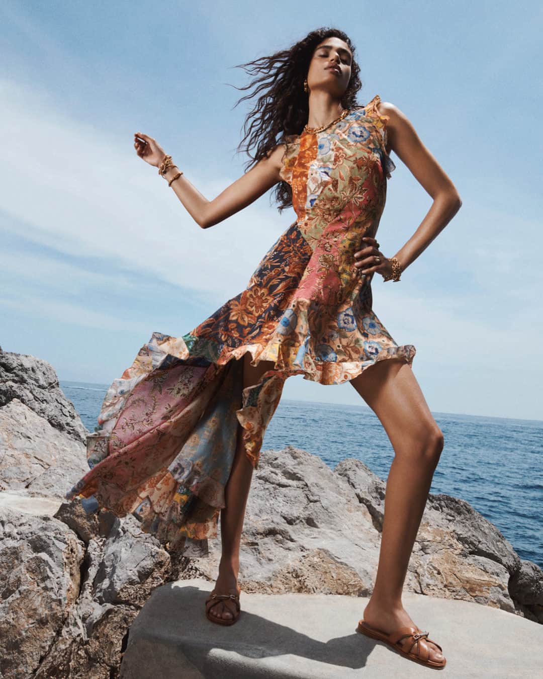 ジマーマンのインスタグラム：「Resort Swim 24: Captured for our latest campaign, the Junie Racer Back Midi Dress styled with the Zimmermann Prisma Slide. Discover new season Swim in stores and online.  #ZimResortSwim24 #zimmermann」