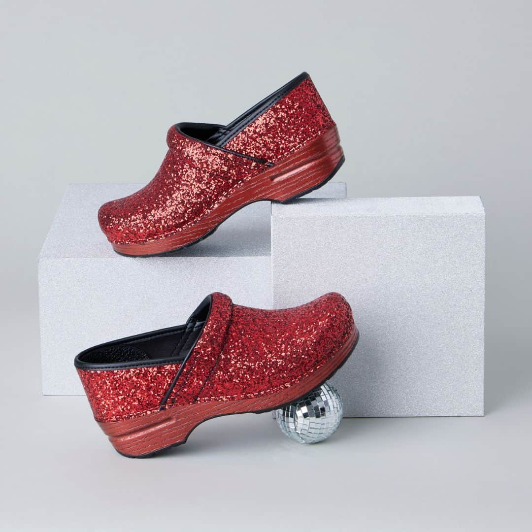 ダンスコのインスタグラム：「The only clogs that SPARKLE! ✨ Be the life of the party this holiday season!  Shop our LIMITED EDITION Glitter clogs, link in bio. #glitter  #danskofootwear #comfort #fashion #ootd #beautiful #happy #cute #travel #smile #joy #life #style #instadaily #friends #family #fun #instagood #gowhereyourehappiest #fallstyle #holidaystyle」