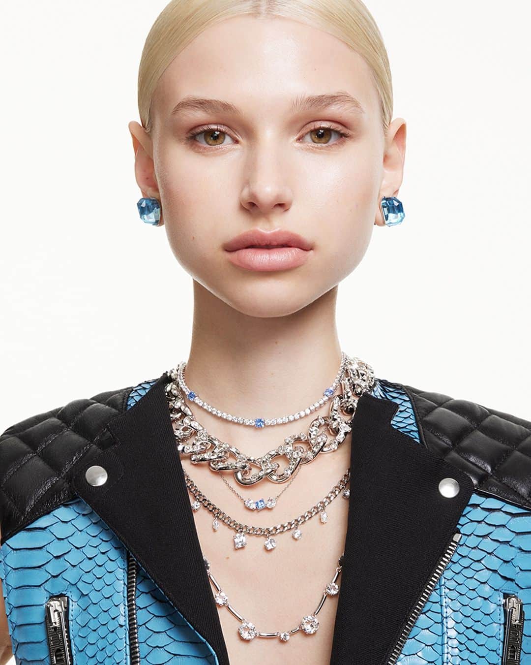SWAROVSKIのインスタグラム：「Focus an ice cool gaze on the stunning blue crystals of the #SwarovskiMatrix, #SwarovskiMesmera and #SwarovskiLucent collections, filled with high-shine pieces to suit every style and Celebrate Wonder.  #Swarovski #CelebrateWonder #CrystalMetamorphosis​​」