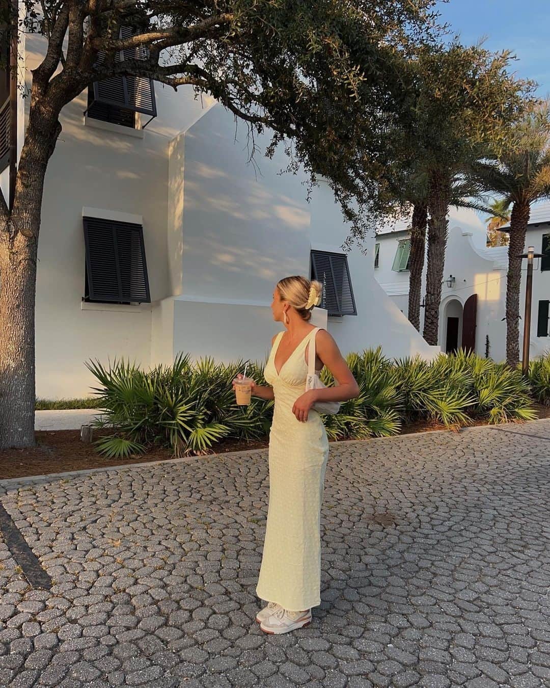 Beginning Boutiqueのインスタグラム：「The dress everyone needs in their wardrobe 💛 @alexissmueller wears our Evilia Yellow Midi Dress! Available now in our Lucky Friday Sales - use code LUCKY25 at checkout 🍀」
