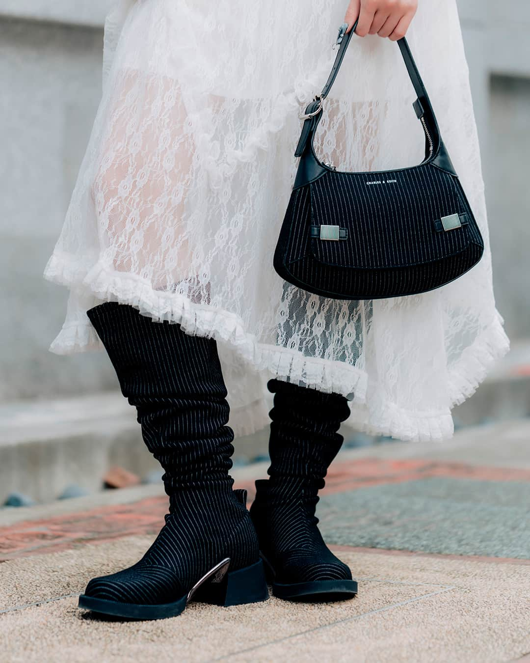 CHARLES & KEITHさんのインスタグラム写真 - (CHARLES & KEITHInstagram)「@venuskiki wears dark, metallic-accented accessories to the Jenn Lee SS24 Show in Taipei.  Discover more via the link in bio.  #AsSeenAtFashionWeek #TPEFW #CharlesKeithFW23 #ImwithCharlesKeith  Products featured: Striped Metallic-Accent Curved Shoulder Bag Devon Striped Metallic-Accent Thigh-High Boots」11月9日 19時00分 - charleskeithofficial