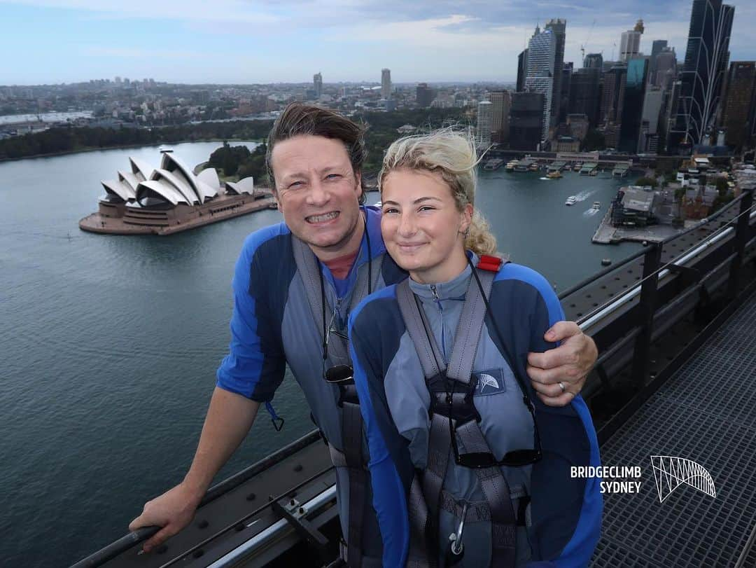 ジェイミー・オリヴァーのインスタグラム：「Just landed is Sydney met up with my little girl Poppy and we did the @bridgeclimb which was the best thing to own the Jet lag it was such an Epic thing to do….it’s my second time and always a pleasure be in owe of this beautiful city and the strong folks that made this bridge ?! …..the weather was on the turn and it was amazing the thunder and lightning in the distance was even better than a sunny day…a magical experience that me and poppy and ben her fella won’t ever forget…with out question a must do in Sydney even if your a local…. Big love to the team there 10/10 from me O xx」