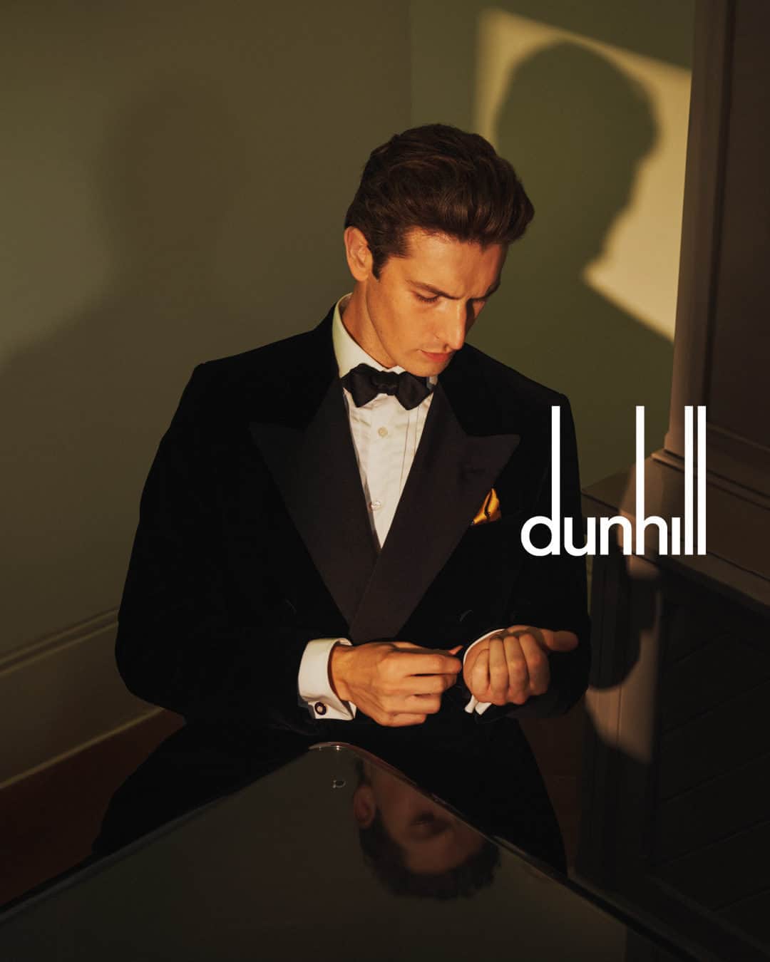 のインスタグラム：「Discover festive gifts and a black tie wardrobe to suit your personal style. A colourful silk square. An eye-catching set of cufflinks. After all, rules are meant to be broken.  Photographed by @thurstanredding and styled by @stuartvwilliamson.  Featuring @oli_lacey.   Prepare for party season with sumptuous accessories and evening wear, now in-store and online at dunhill.com」