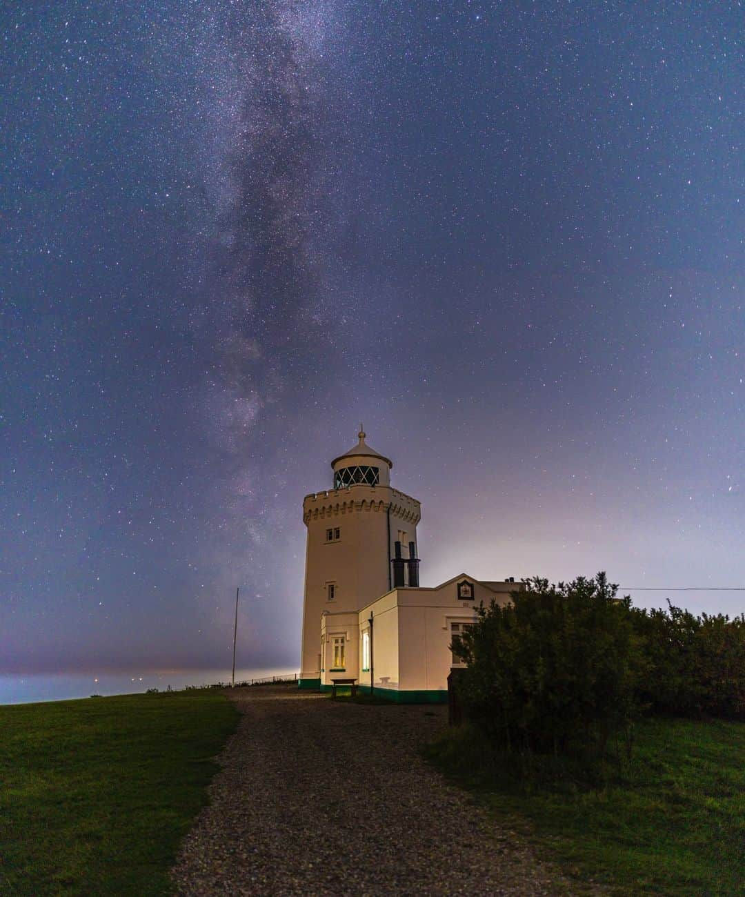 Canon UKのインスタグラム：「The perfect example as to why you should always take your camera with you wherever you go. You never know what opportunities will appear 📸📍  Whilst working on an offshore windfarm near Ramsgate, Tom managed to capture the Milky Way above and the lighthouse below, making a perfect night shot 🌌✨  What are your tips for handling low-light situations while maintaining image quality? Let us know in the comments below 👇  📷 by @wrightsaycheesephotography   #mycamerabag #canongear #dailygear #canonuk #mycanon #canon_photography #liveforthestory #canoncamera #EOSR5」