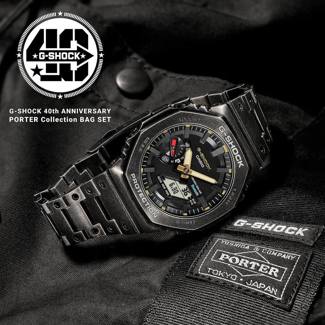 G-SHOCKのインスタグラム：「G-SHOCK 40th Anniversary  Limited Edition  PORTER Collection Bag Set  40周年を記念して、バッグメーカー“吉田カバン”のメインブランド「PORTER」とのコラボレーションアイテムが本日発売に！  フルメタルモデルのGM-B2100をベースに、エイジド加工でヴィンテージテイストに仕上げた特別仕様に。ダイアルには初代モデルDW-5000と同じレッド、ブルー、ゴールドのカラーリングを配しました。  本モデルには、PORTERとコラボレーションして製作した特別なコレクションバッグもご用意。GM-B2100のディテールに着目し、八角形の形状にデザインしています。高密度に織あげられた撥水性の高いベンタイル生地を贅沢に使い、型押しされたレザーのG-SHOCK40周年のマークも縫い付けられています。  Join the G-SHOCK 40th anniversary celebration with a very special, limited edition collaboration with the renowned Japanese bag brand PORTER. True to the toughness-driven identity of G-SHOCK, this special edition gives the full metal analog GM-B2100 a unique aged finish, adding a vintage touch to the octagonal form inherited from the design concept of the very first G-SHOCK, the DW-5000. Red, blue, and gold accents on the dial also pay homage to the G-SHOCK debut.  For this collaboration, G-SHOCK partners with PORTER to create a unique collector’s bag crafted in an octagonal shape that reflects the GM-B2100 design. Made with densely woven, water-repellent Ventile® fabric, this premium bag features a leather tag stamped with the G-SHOCK 40th-anniversary mark.  GM-B2100VF-1AJR   @porter_yoshida_co.official  #g_shock #gshock40th #collaboration #porter #yoshidakaban #gmb2100 #腕時計 #40周年 #吉田カバン #ポーター」