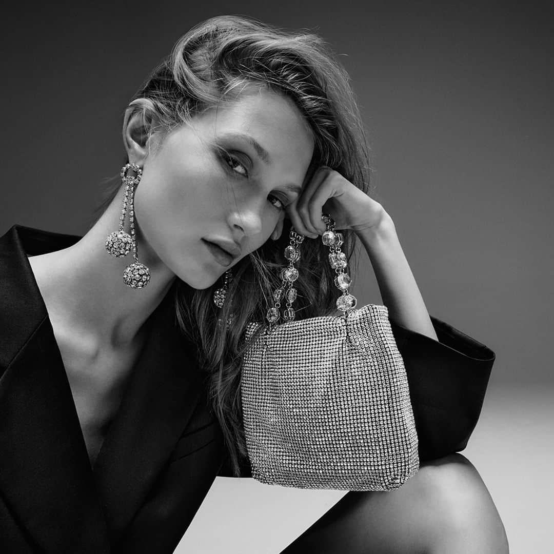 Aquazzuraのインスタグラム：「Add that dazzling finishing touch. Once your shoes are set, it’s time to dive into accessorizing. Explore Bubbles Earrings, Crystal Galactic Mini Tote, and the rest of our elevated styles online at aquazzura.com   #AQUAZZURA」