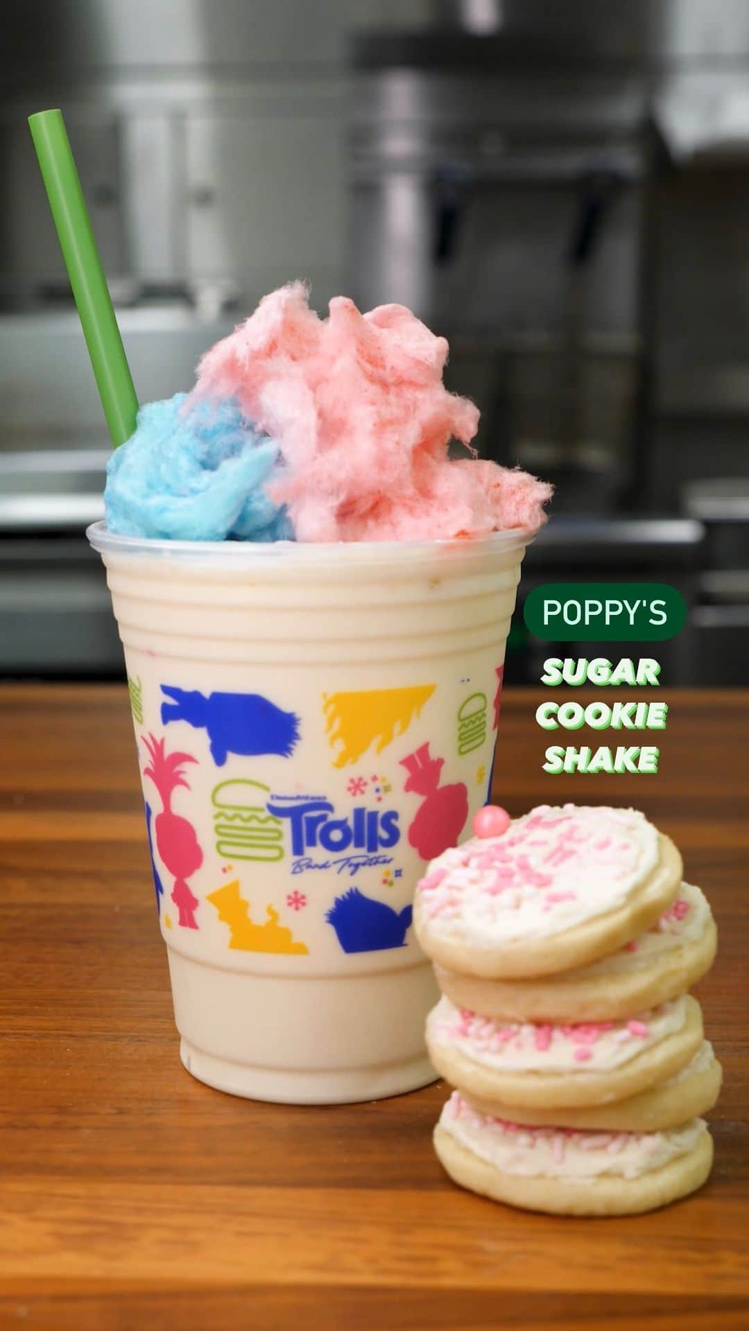 SHAKE SHACKのインスタグラム：「We’re spreading cheer just like Poppy does — Poppy’s Sugar Cookie Shake is hand-spun sugar cookie frozen custard, mixed with cookie dough pop candy, topped with whipped cream and of course, cotton candy.    See #TrollsBandTogether only in theaters November 17!」