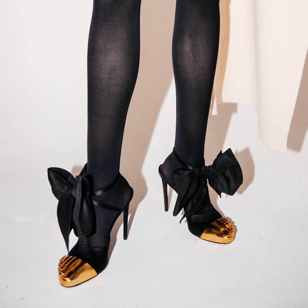 のインスタグラム：「THE SURREAL DEAL 👀 Presenting the sharp-witted and exclusive new shoe arrivals from Daniel Roseberry‘s latest @schiaparelli collection, including décolleté keyhole pumps and golden toed platform boots. Discover them now at our Schiaparelli shop on the 4th Floor.」