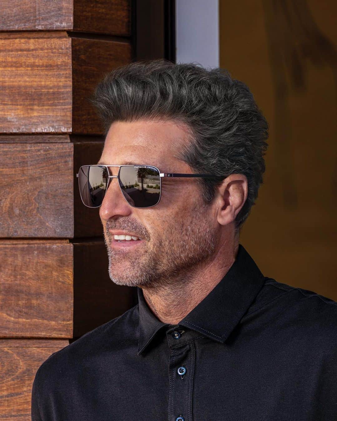 パトリック・デンプシーのインスタグラム：「See the world through the Porsche Design lens of luxury.  Inspired by the sleek rims of the Porsche 911 Turbo, the sunglasses from the new Motion series make a statement like no other. With a unique hinge featuring an air space and ultra-lightweight materials, comfort meets cutting-edge design. Crafted with high-performance RXP and stainless steel, they’re as light as a feather, ensuring you look and feel your best. The purist design, modern lines, and stunning color options make this series the epitome of sophistication. Choose from two chic shapes, as well as the option for a prescription frame.  Get your pair by clicking the link in our story.  #PorscheDesign #PorscheLifestyle #PorscheDesignEyewear #Eyewear #PatrickDempsey」