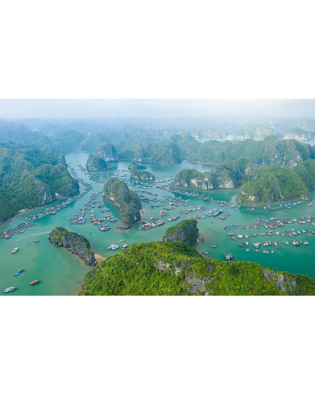 National Geographic Travelさんのインスタグラム写真 - (National Geographic TravelInstagram)「Photo by @tobyharriman | This traditional fishing village in Lan Ha Bay, Vietnam, floats atop emerald waters among lush limestone karst formations. Villagers depend on the sea for survival and make a living from fishing, aquaculture, and tourism. It looks like paradise, but their unique way of life is threatened by wastewater and plastic pollution, unsustainable tourist activities, and climate change. Follow @tobyharriman for more. #vietnam #aerial」11月12日 2時30分 - natgeotravel