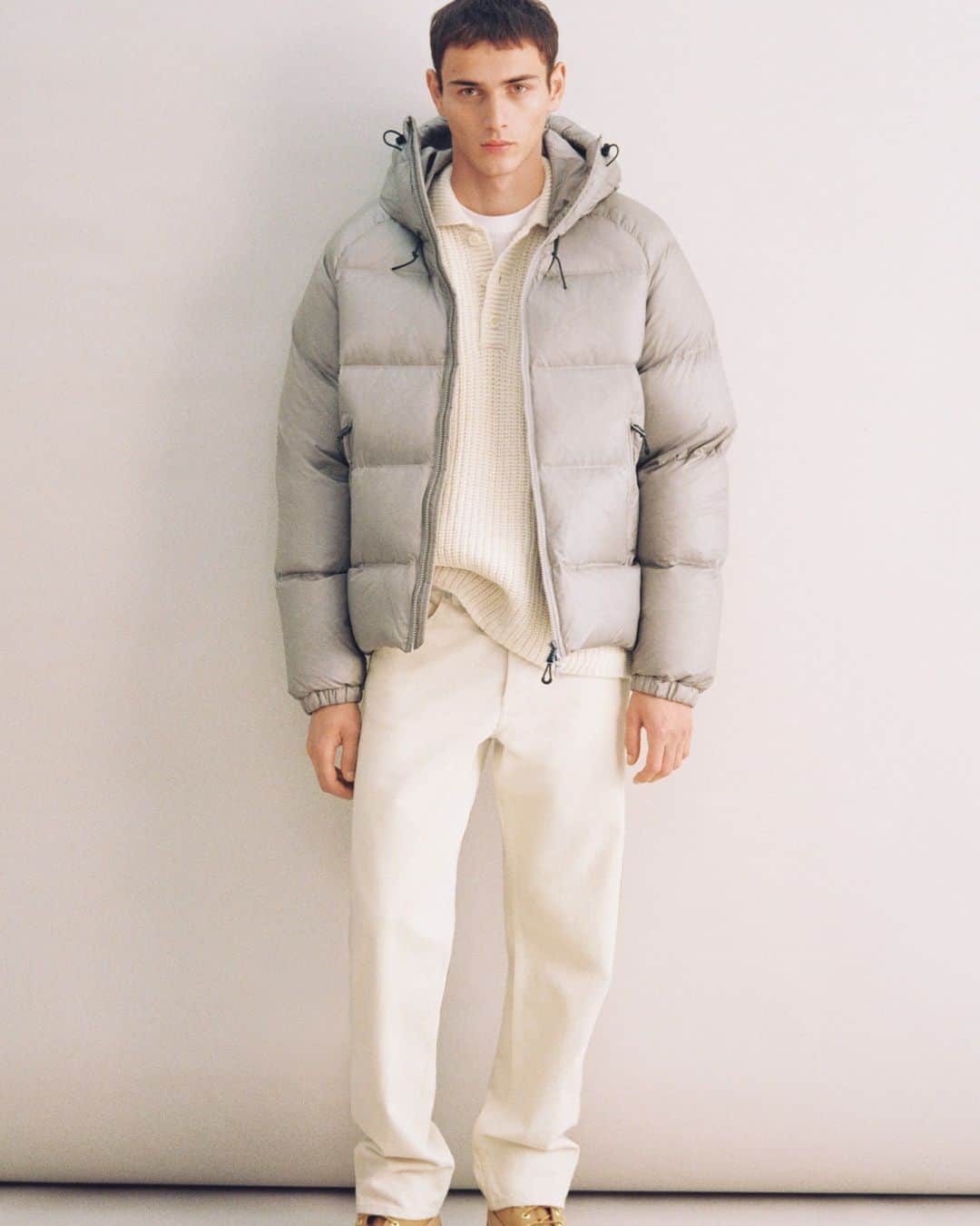 ARKETのインスタグラム：「Sporty down jacket with a regular, puffy fit. Made with a polyester shell and filling made from a blend of upcycled feathers and down from @redowninc. Styled with a down-filled hood and double jetted pockets at front. Smart detailing include a two-way zip at front and elastics at cuffs, bottom hem (adjustable) and hood opening (adjustable). Explore all of our seasonal outerwear pieces: link in bio. - #ARKET」