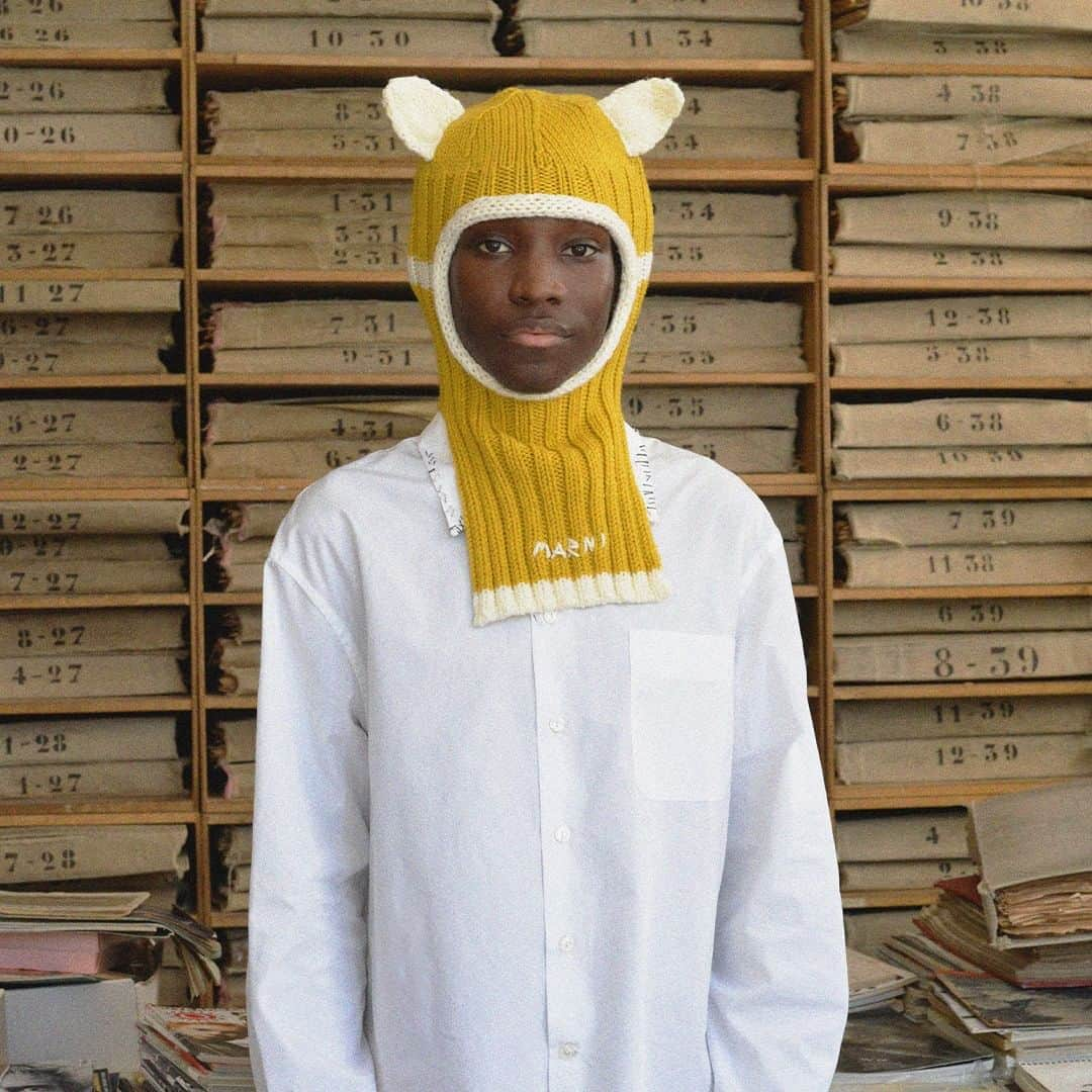 マルニさんのインスタグラム写真 - (マルニInstagram)「Terry is wearing a yellow Balaclava with ears from Marni's Festive Marvels, envisioned by creative director Francesco Risso @asliceofbambi. The collection, captured by the versatile artist Patrick Welde, features ready-to-wear, leather goods and accessories, which awaken in the daily life of the people living in Paris, the ideal location for the tireless pursuit of happiness.  The collection is rolling out online and in stores.   Photography & Styling: Patrick Welde @patrickwelde Hair: @aurelienhairstylist Model: Terry at Newmadison  #marni」11月11日 20時00分 - marni