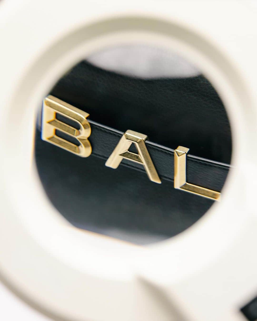 バリーのインスタグラム：「BALLY SPELL  Introducing the Spell bag, featuring a new, tridimensional reinterpretation of the Bally logo, inspired by a vintage motif found in the House archives.  #Bally」