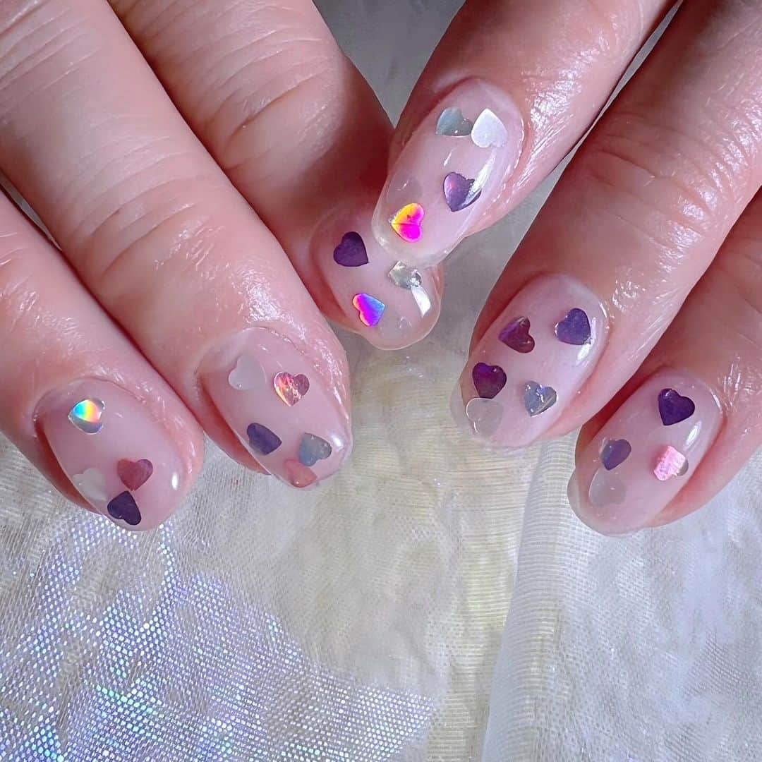 なかやまちえこのインスタグラム：「💜🩷🩶⠀ ⠀ @mypanda.mypanda ⠀ 透明にハートのホログラムネイル♡⠀ ⠀ @aby_sharenail #nail #nails #nailart #ネイル #美甲 #ネイルアート  #japanesenailart #manucure #japanesenails #manicurist #gelnails #أظافر #네일아트 #미용  #เพ้นท์เล็บ #artedeuñas #เพ้นท์เล็บเจล #ジェルネイルデザイン #ネイルデザイン #nagelkunst #ハートネイル #heartnails」
