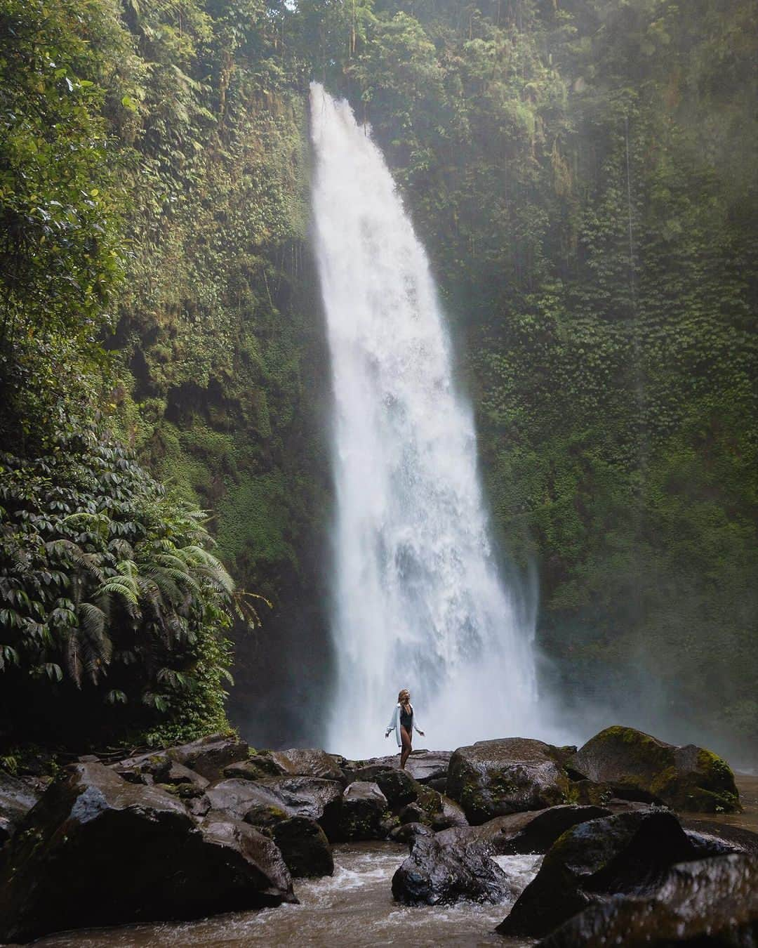 Coronaさんのインスタグラム写真 - (CoronaInstagram)「Nungnung waterfall near Ubud, Bali is one of the tallest and strongest waterfalls in Indonesisa. ⁣ ⁣  A hidden gem, adventurists will need to hike through several smaller waterfalls to reach it. Trek down through a tropical gorge and after a well earned 500 steps, you'll reach this incredible spot. ⁣ ⁣ Be sure to pack a waterproof rucksak as the surroundings are beautiful, but the waterfall is unpredictable. ⁣ ⁣ #ThisIsLiving ⁣ ⁣ 📸: @travelifejournal⁣ ⁣ #Indonesia」11月12日 1時00分 - corona