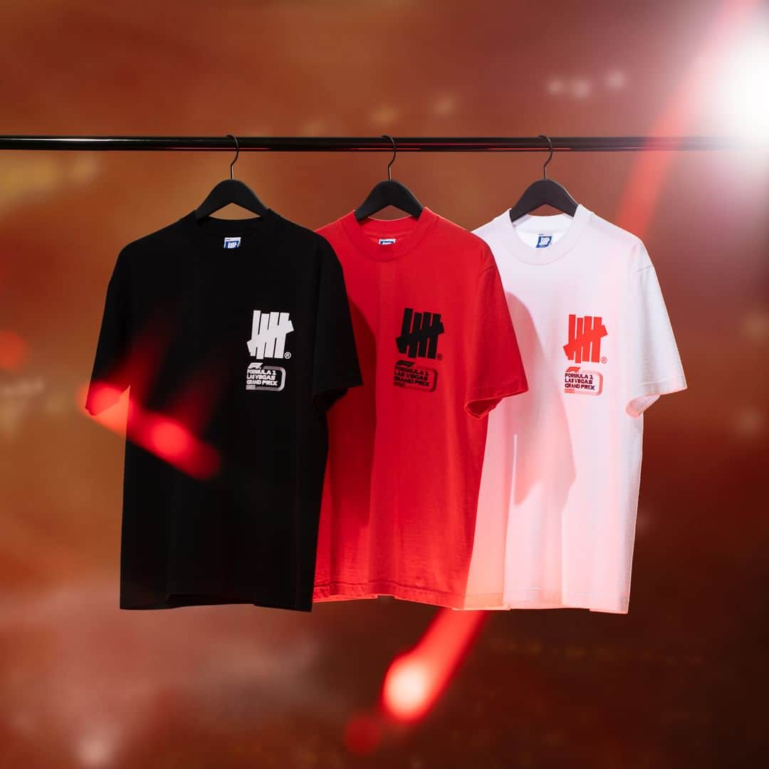 UNDFTDのインスタグラム：「Undefeated x Formula 1 Las Vegas Grand Prix  The UNDEFEATED x F1 LVGP Lockup Short-Sleeve Tee and Logo Short-sleeve Tee are both 100% cotton tubular knit with soft-hand screen printed UNDEFEATED x F1 logo lockups on the front and back. The Lockup Short-Sleeve Tee is available in Black, Red and White, and the Logo Short-Sleeve Tee is available in Neon Green, Neon Pink and Neon Yellow.  Available Monday, 11/13 at 11am at all UNDEFEATED Chapter Stores and 8am PST at Undefeated.com」